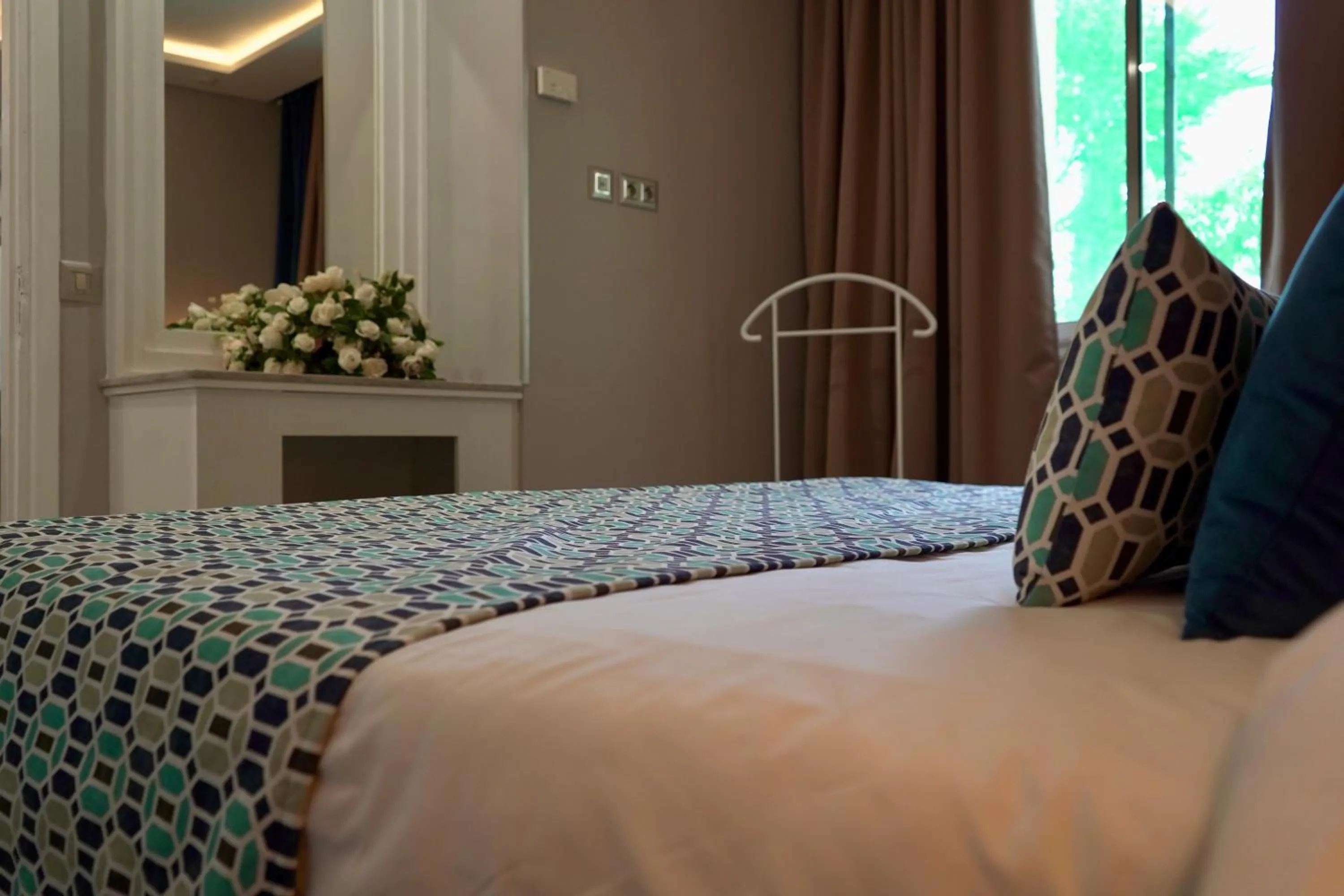 Bedroom, Bed in Suites Hôtel Les Charmilles & Spa