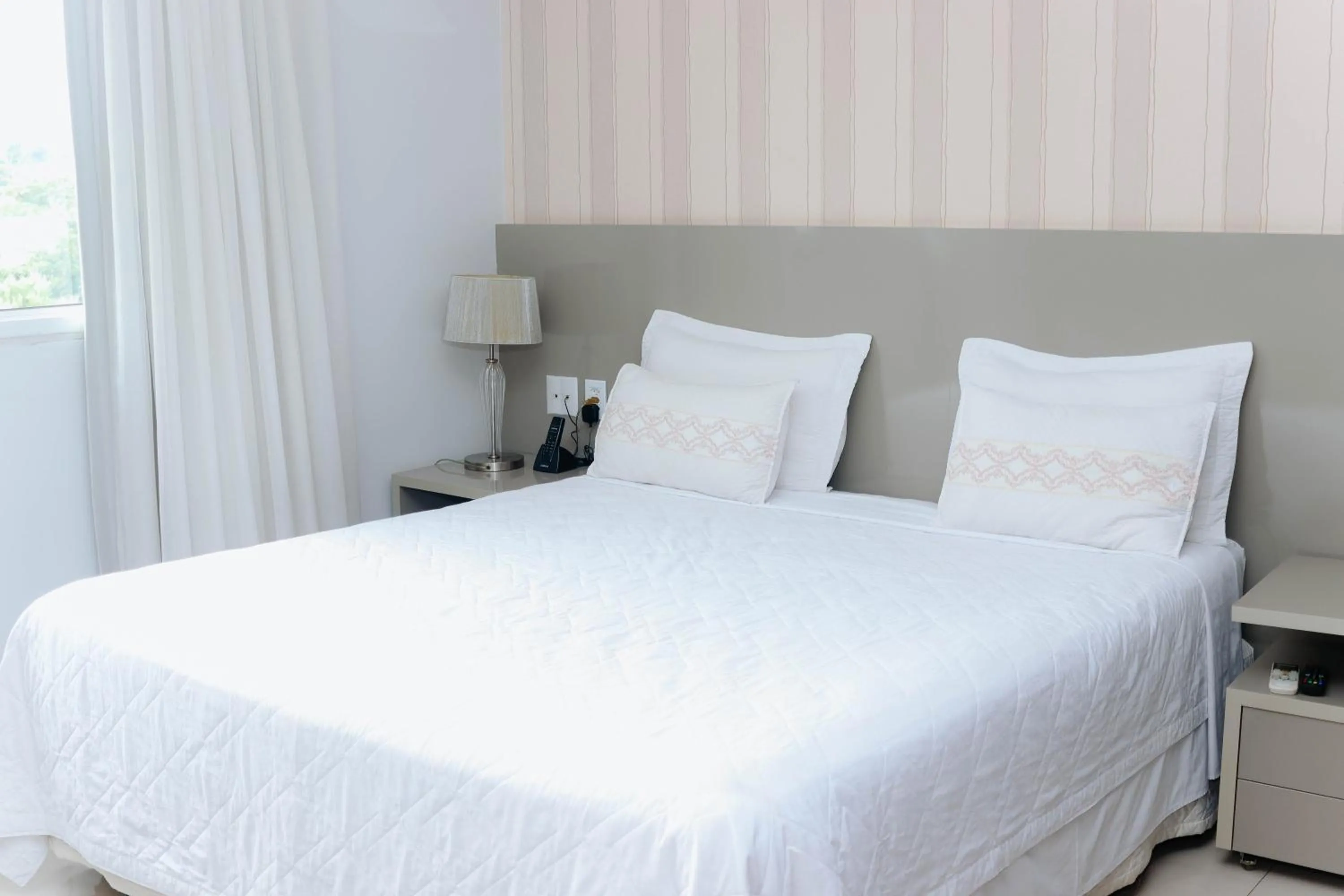 Bed in Premier Pallace Hotel