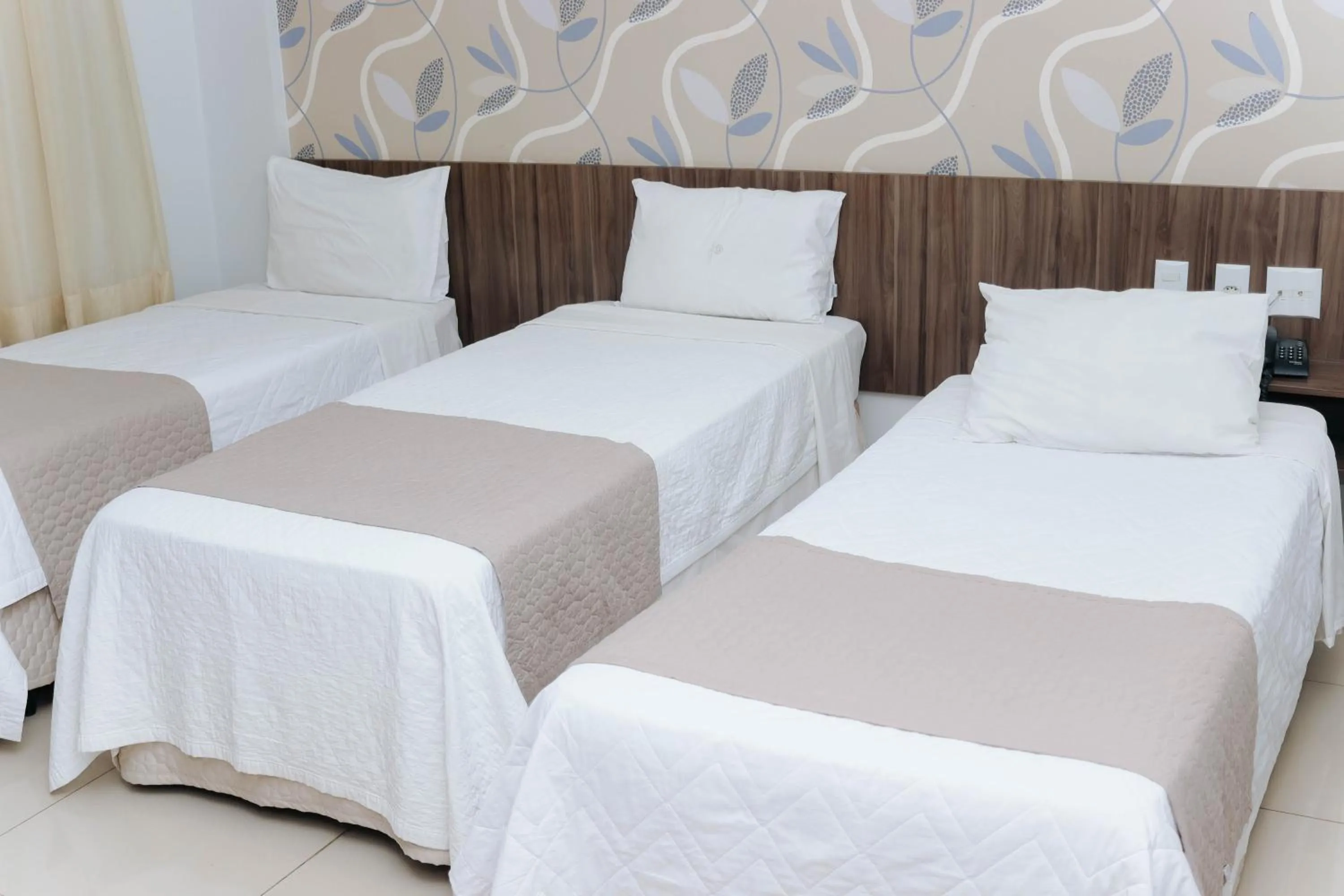 Bed in Premier Pallace Hotel