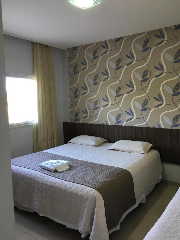 Bed in Premier Pallace Hotel