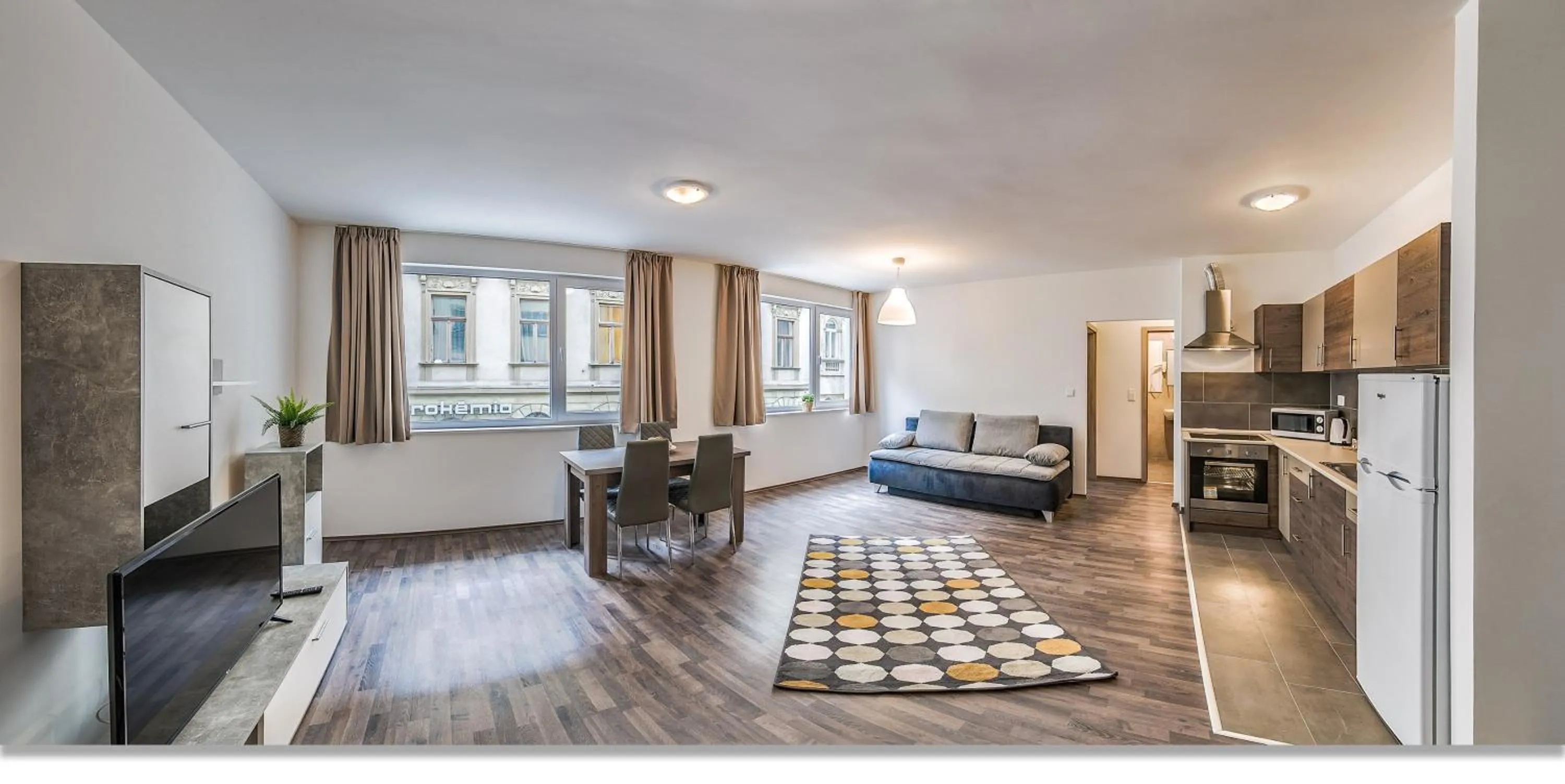 Living room, Bed in Nova City Apartments