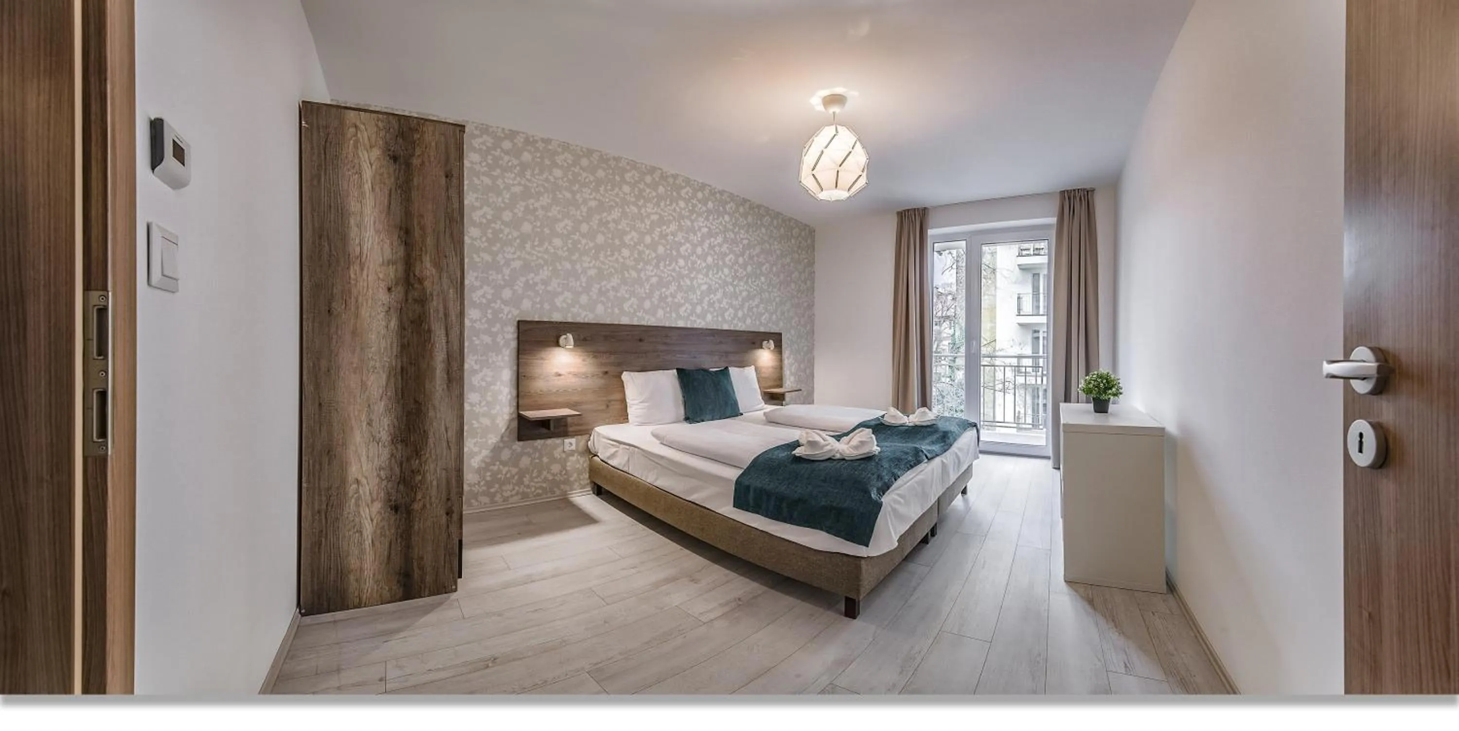 Photo of the whole room, Bed in Nova City Apartments