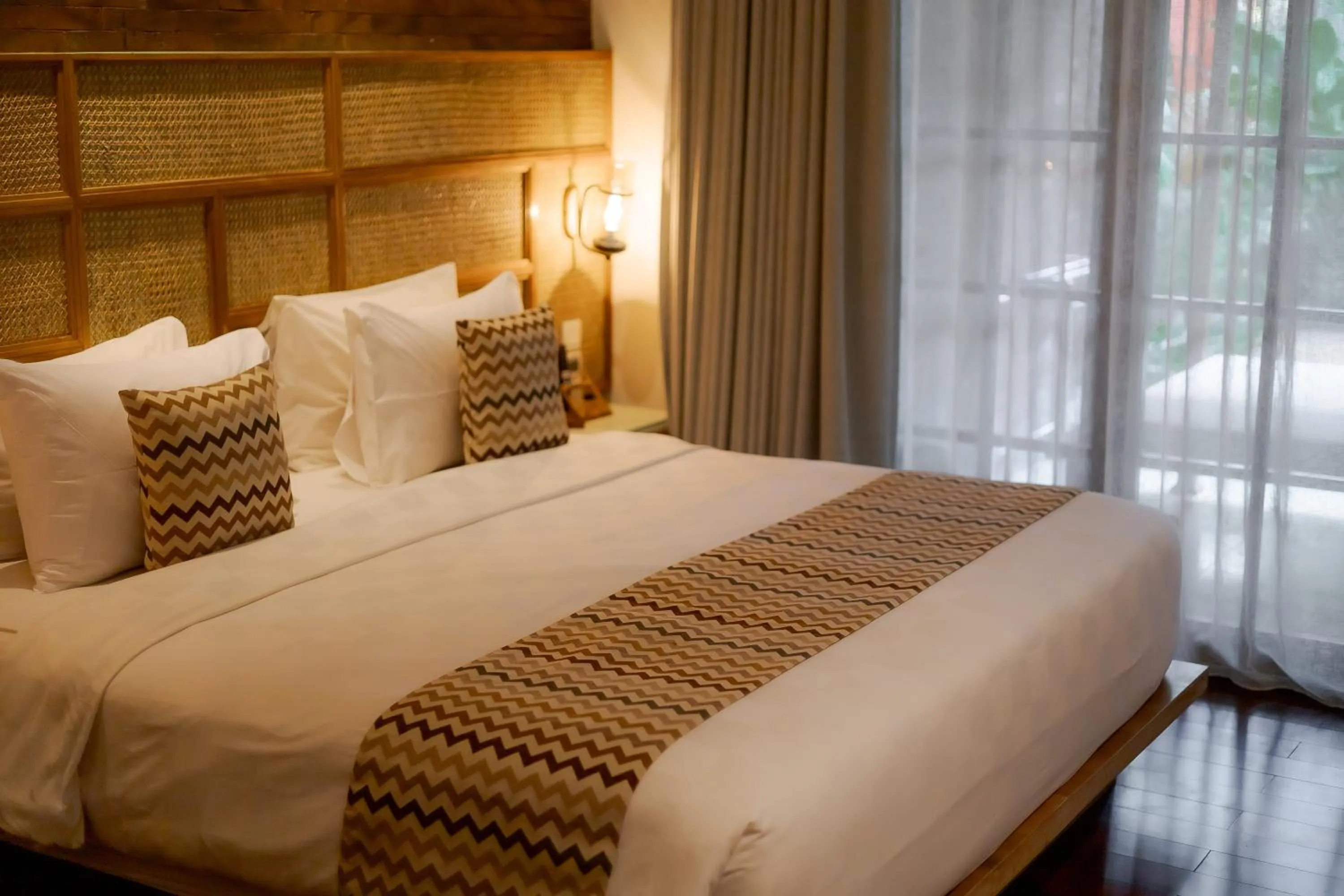 Bed in Fourteen Roses Boutique Hotel, Kuta