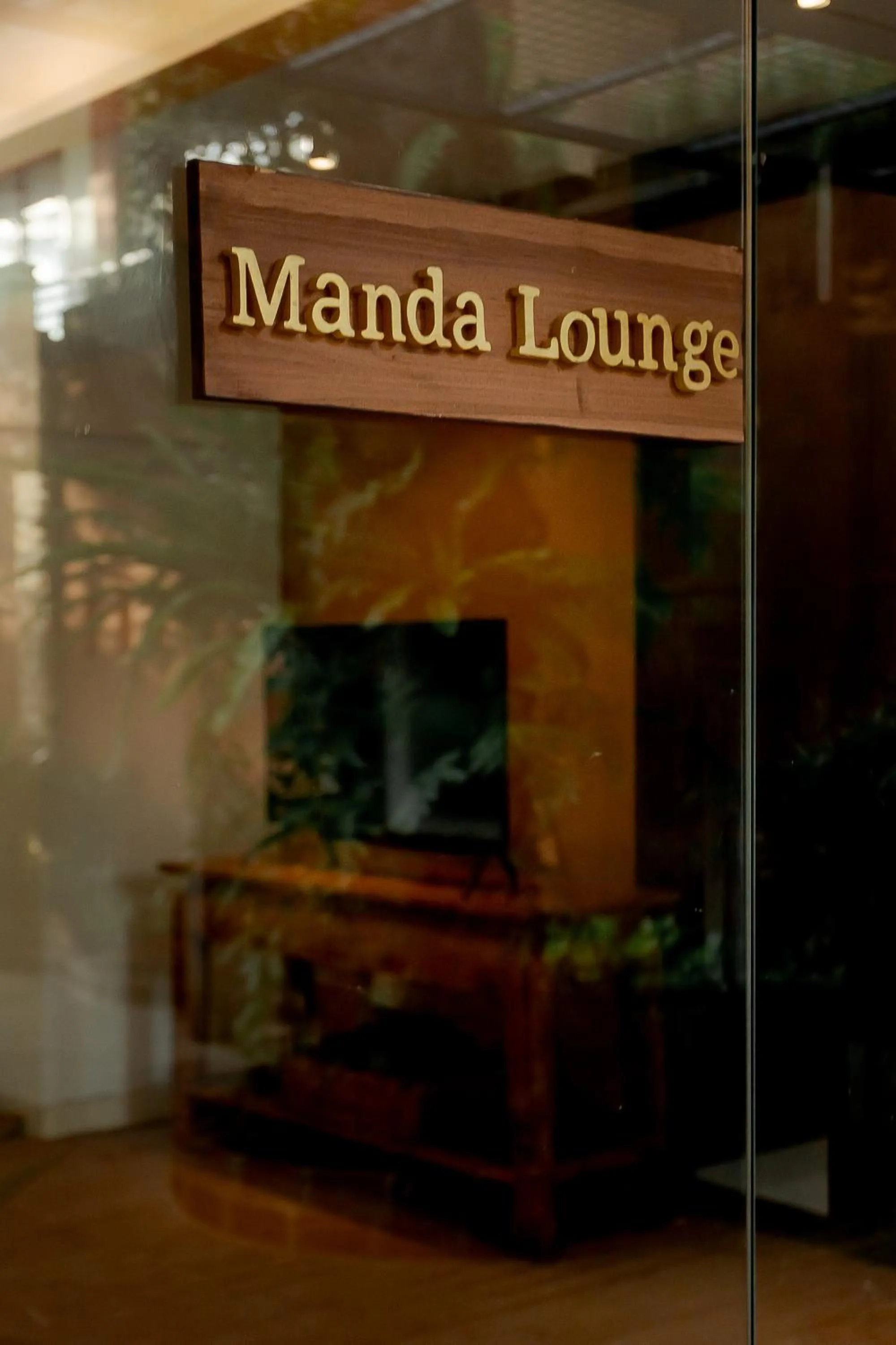 Communal lounge/ TV room in Fourteen Roses Boutique Hotel, Kuta