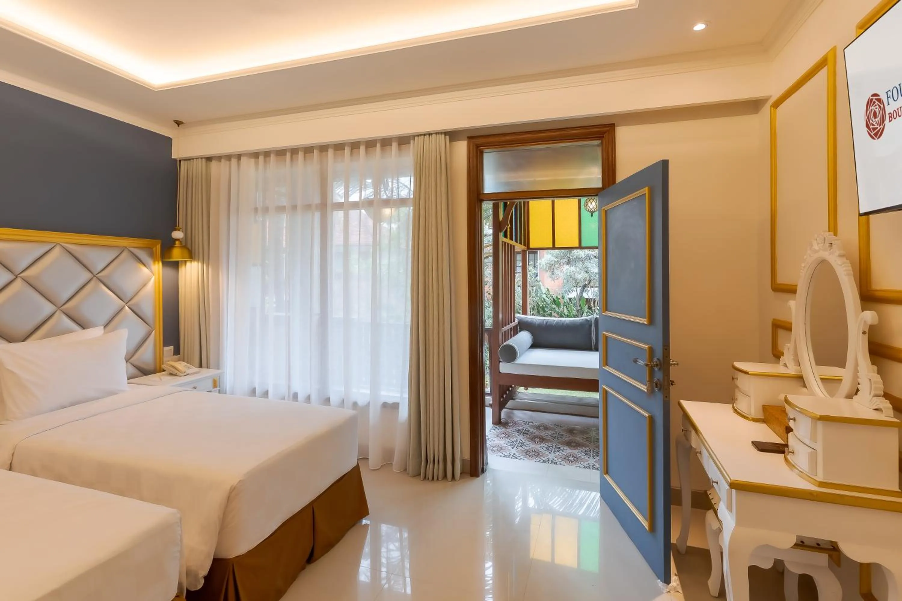 Photo of the whole room, Bed in Fourteen Roses Boutique Hotel, Kuta