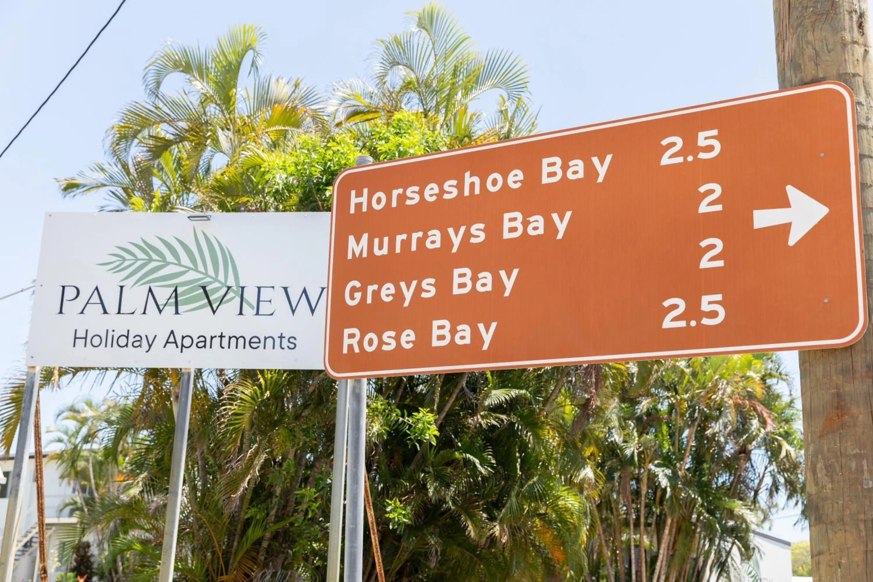 Property logo or sign in Palm View Holiday Apartments