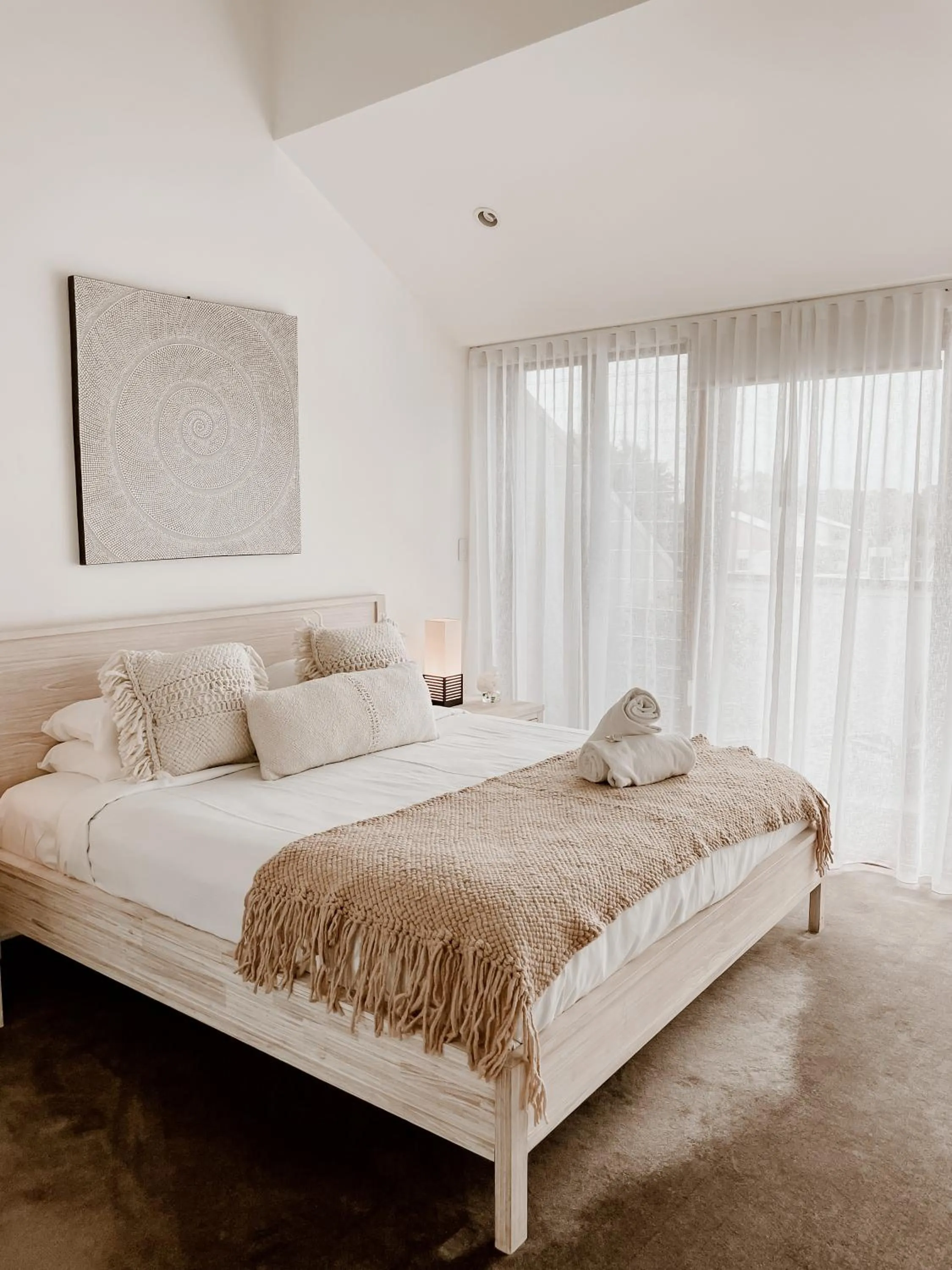 Bed in Byron Butter Factory Apartments