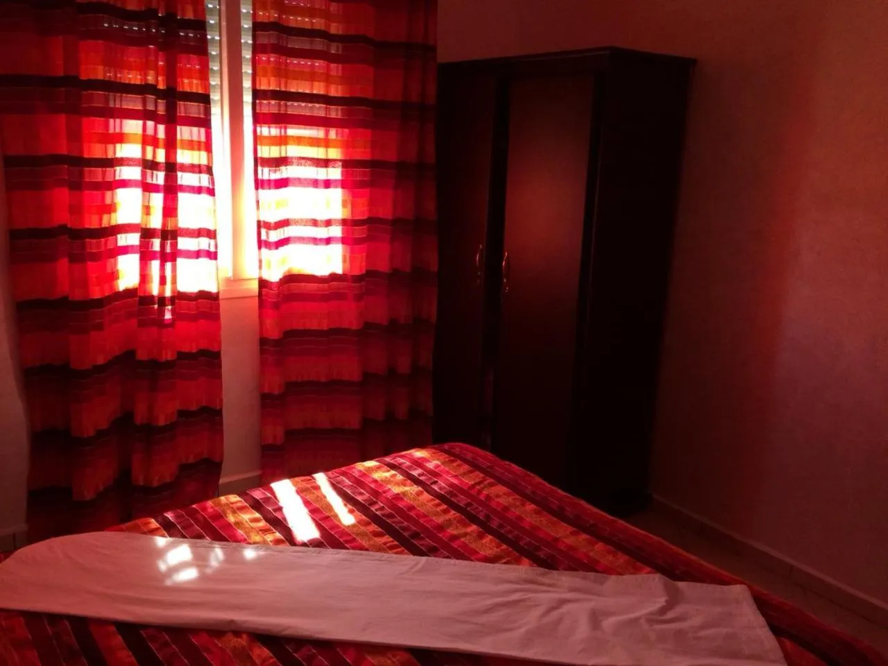 Bed in ITRANE GUEST HOUSE