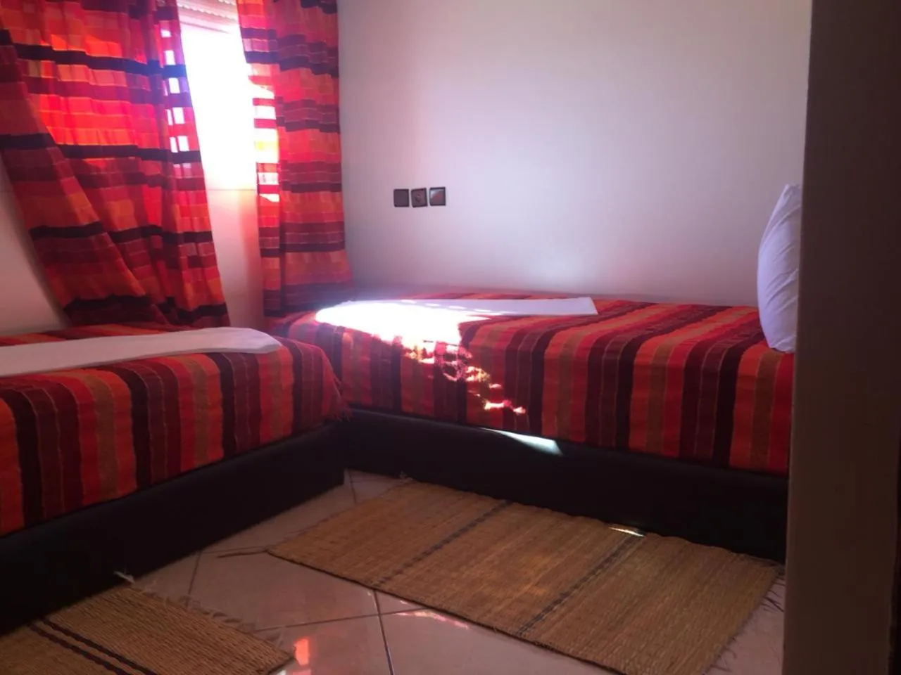 Bed in ITRANE GUEST HOUSE
