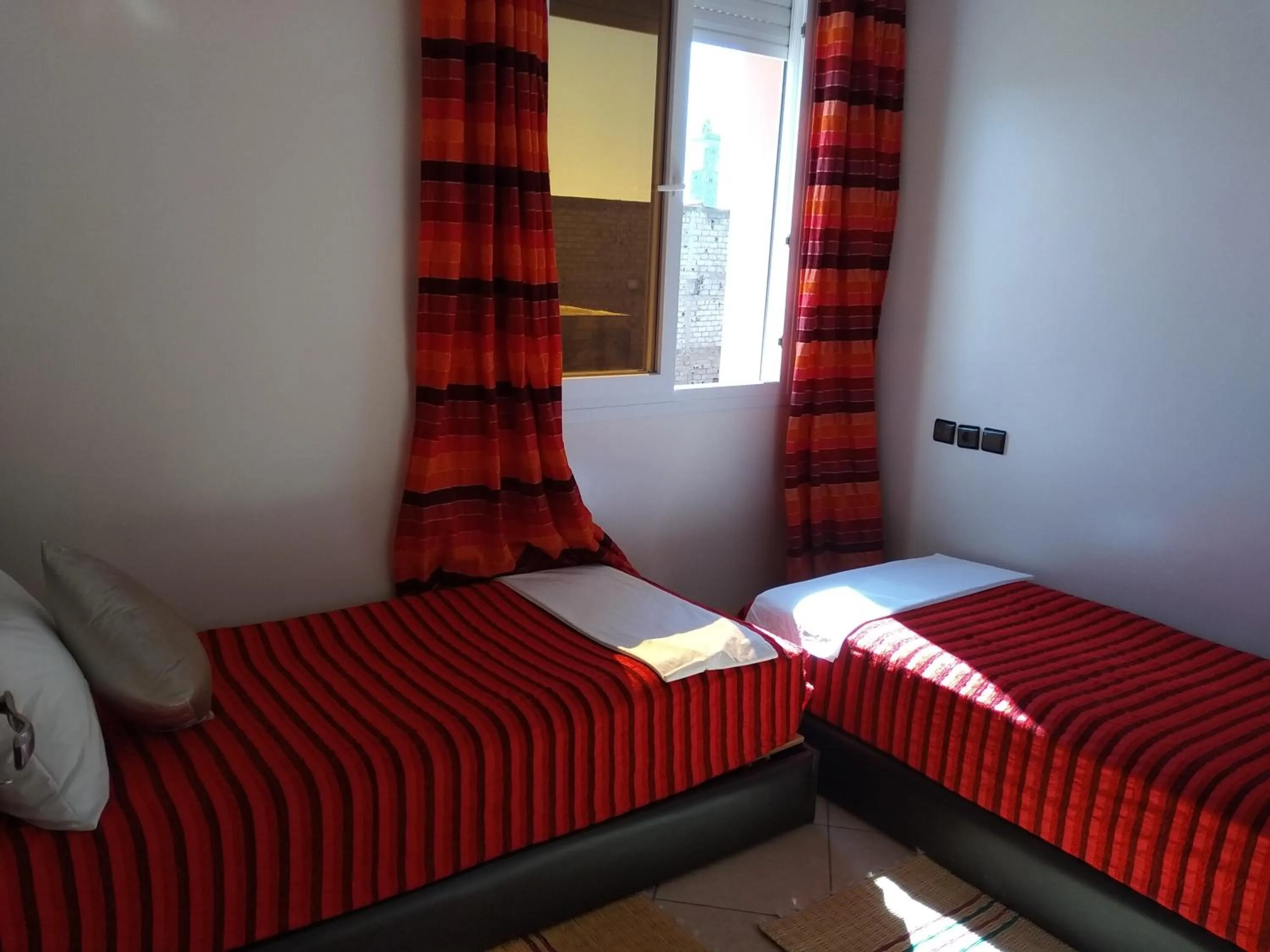 Bed in ITRANE GUEST HOUSE