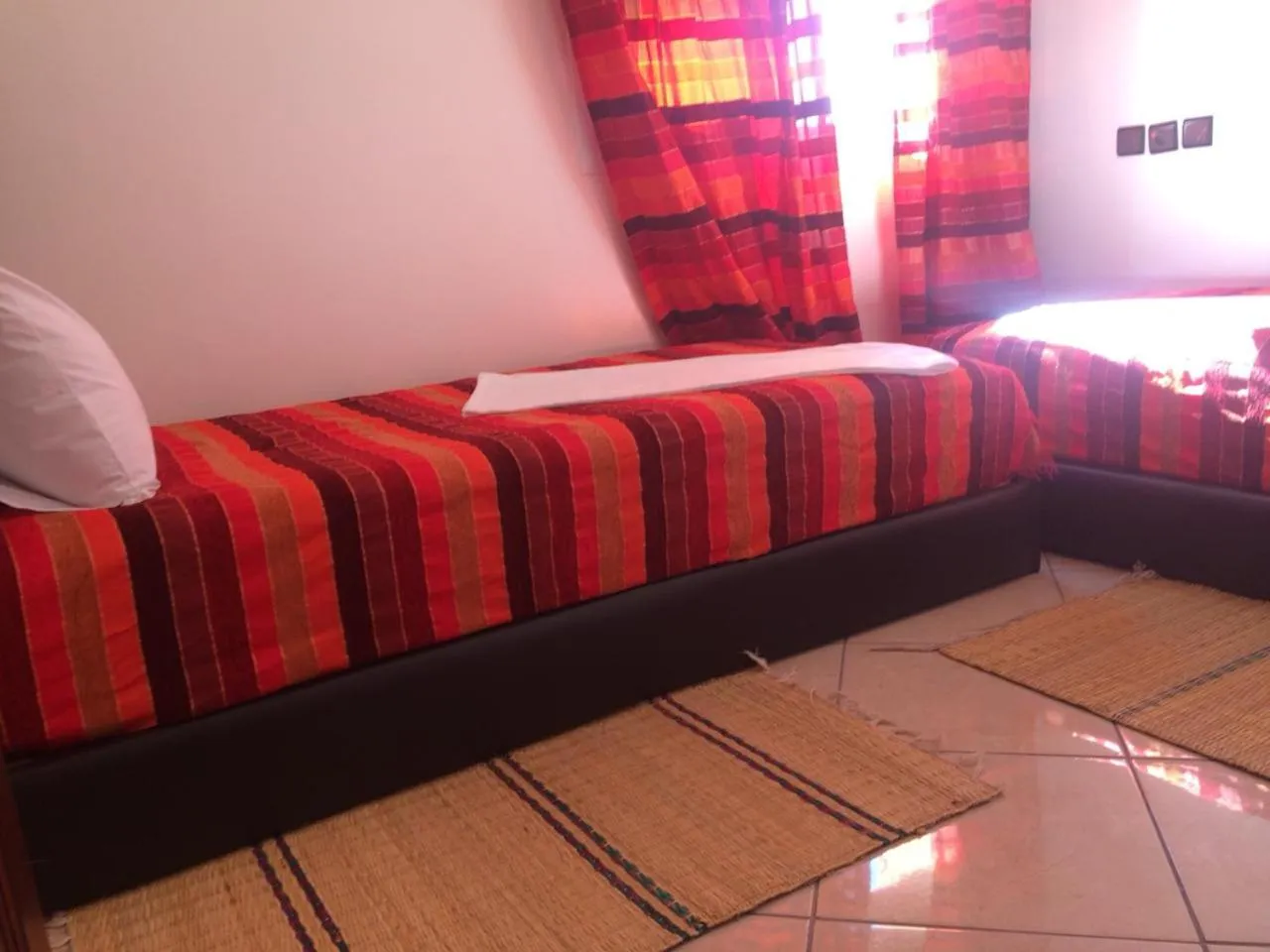 Bed in ITRANE GUEST HOUSE
