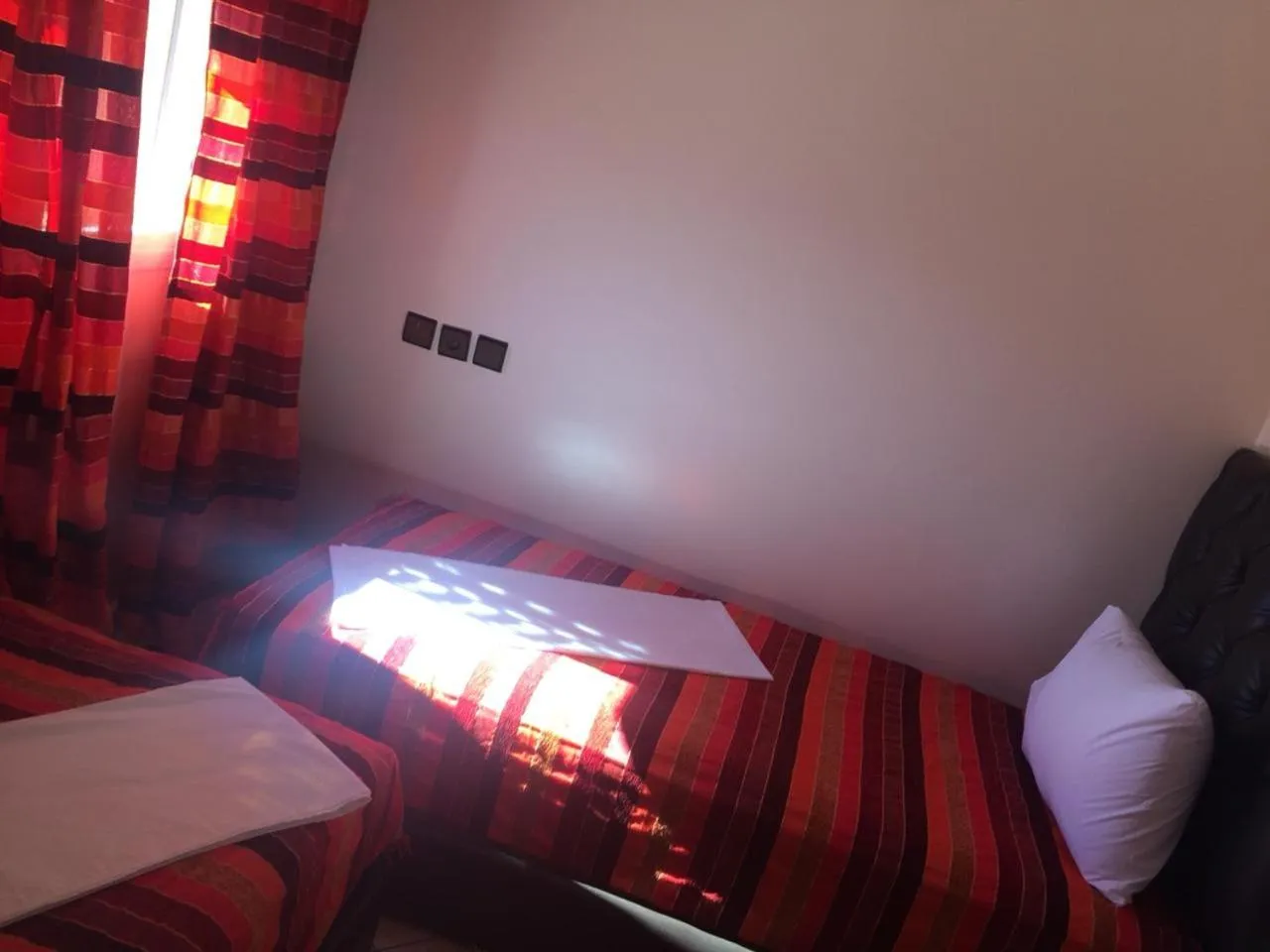 Bed in ITRANE GUEST HOUSE