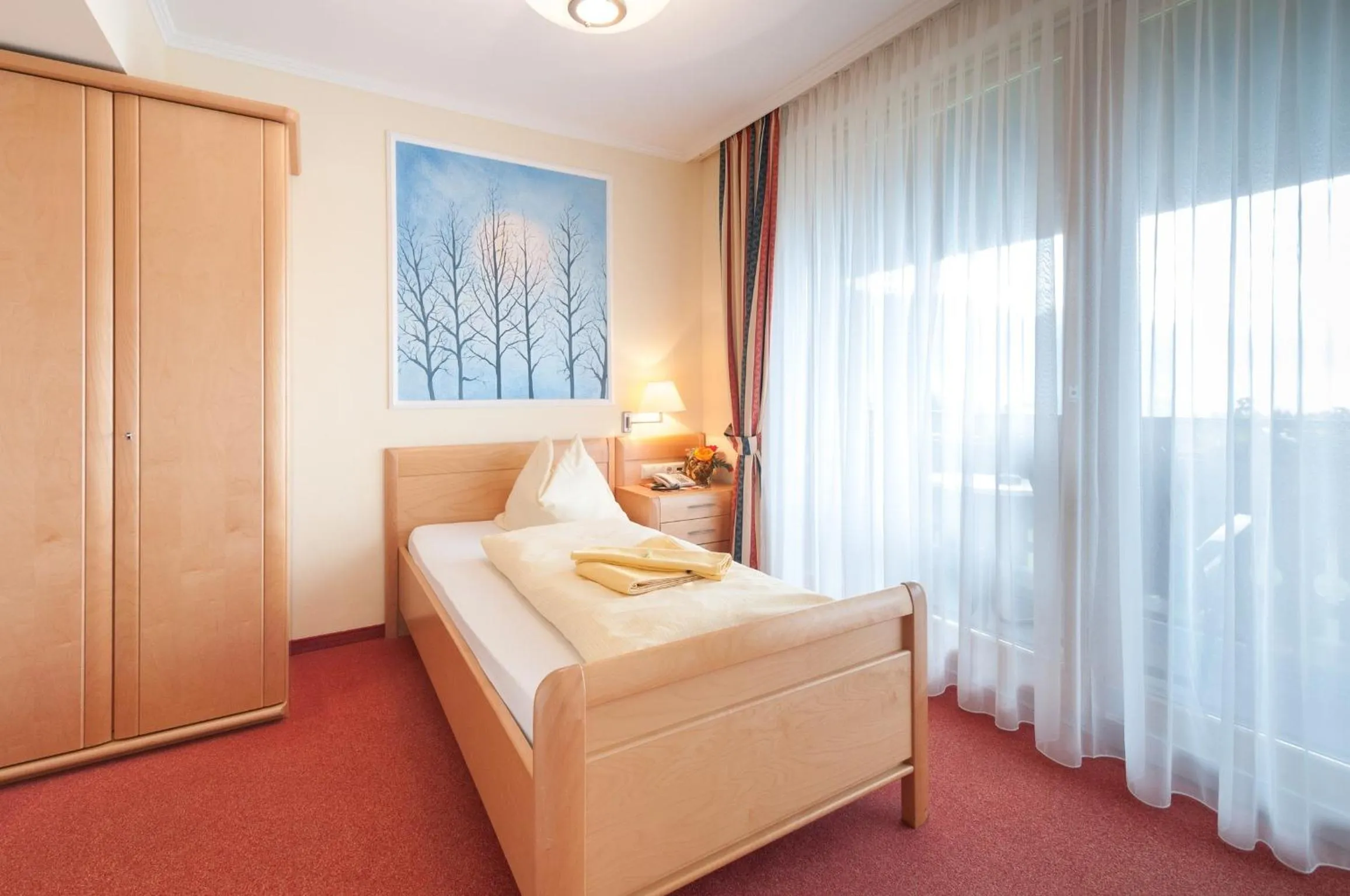 Photo of the whole room, Bed in Hotel Landhof Simeter GMBH