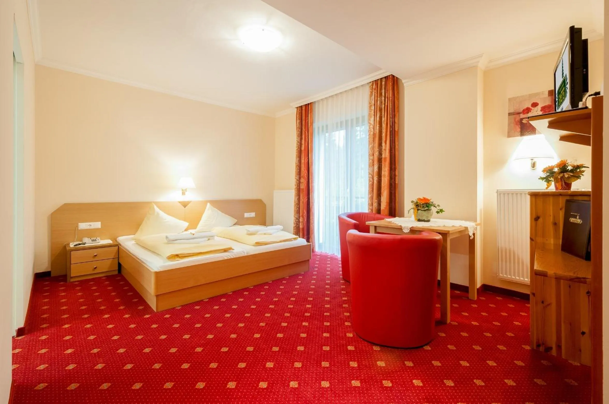 Photo of the whole room, Bed in Hotel Landhof Simeter GMBH