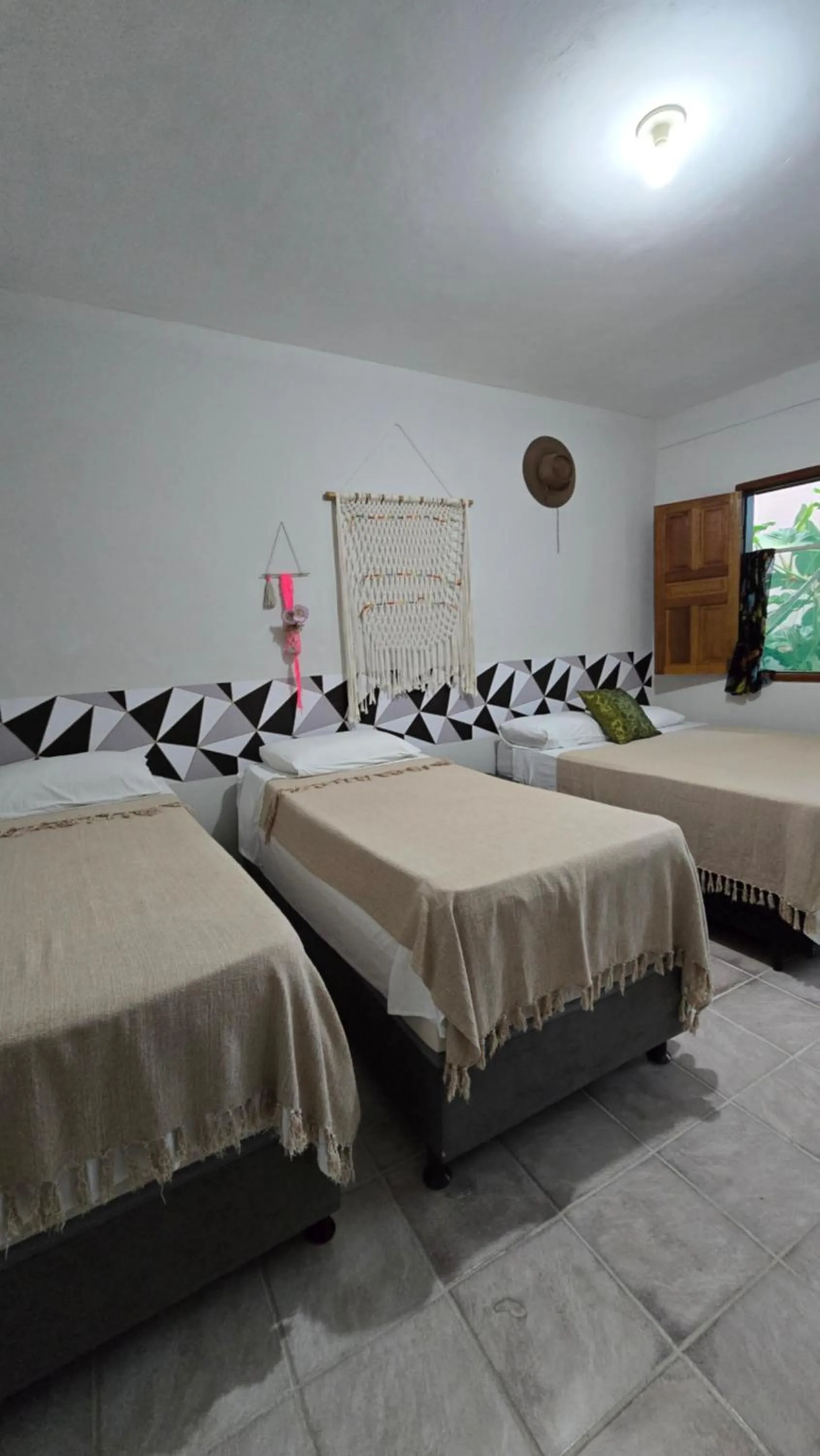 Photo of the whole room, Bed in Pousada Mikaela Arraial