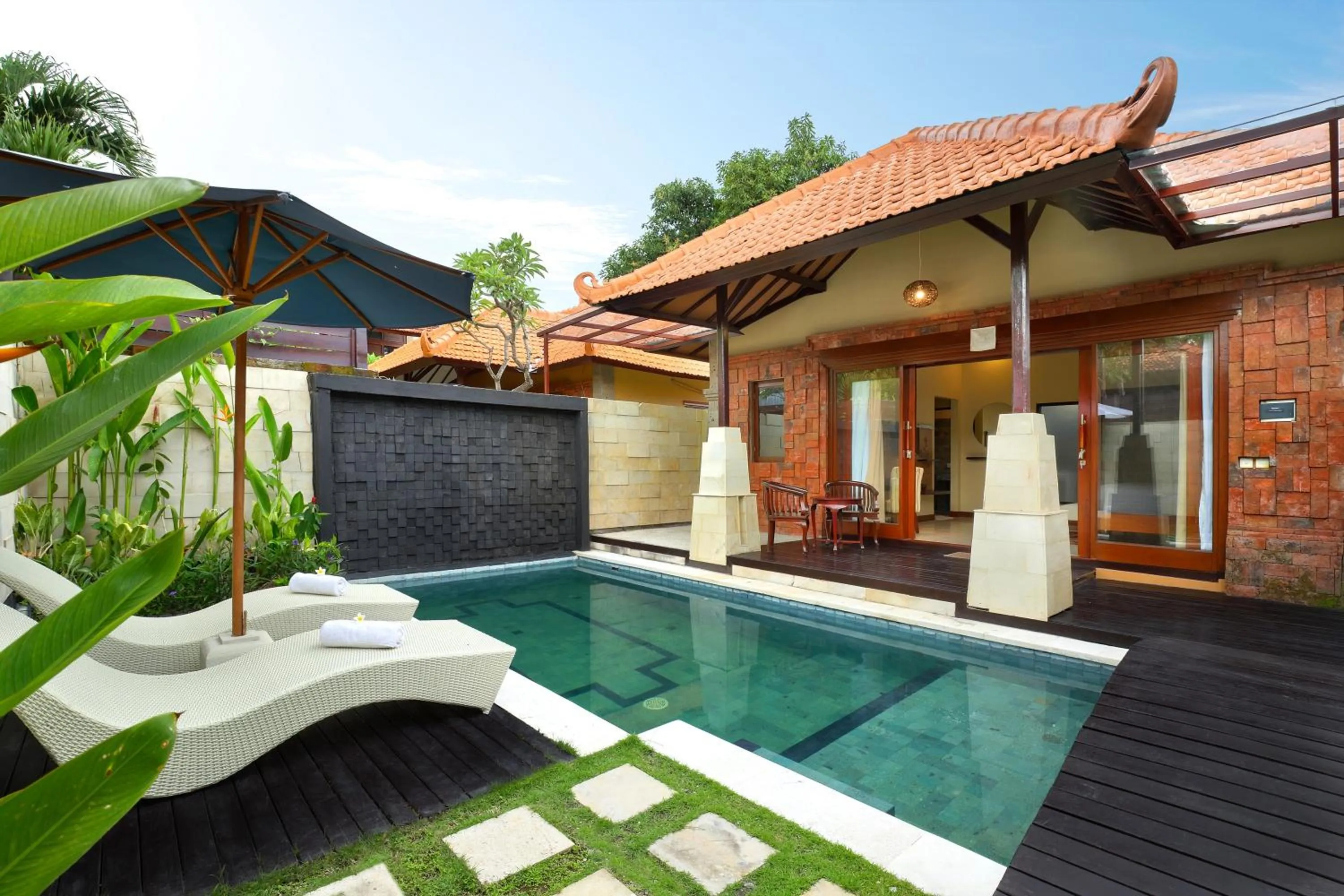 Swimming pool in Mahe Garden Inn and Villas by Kamara