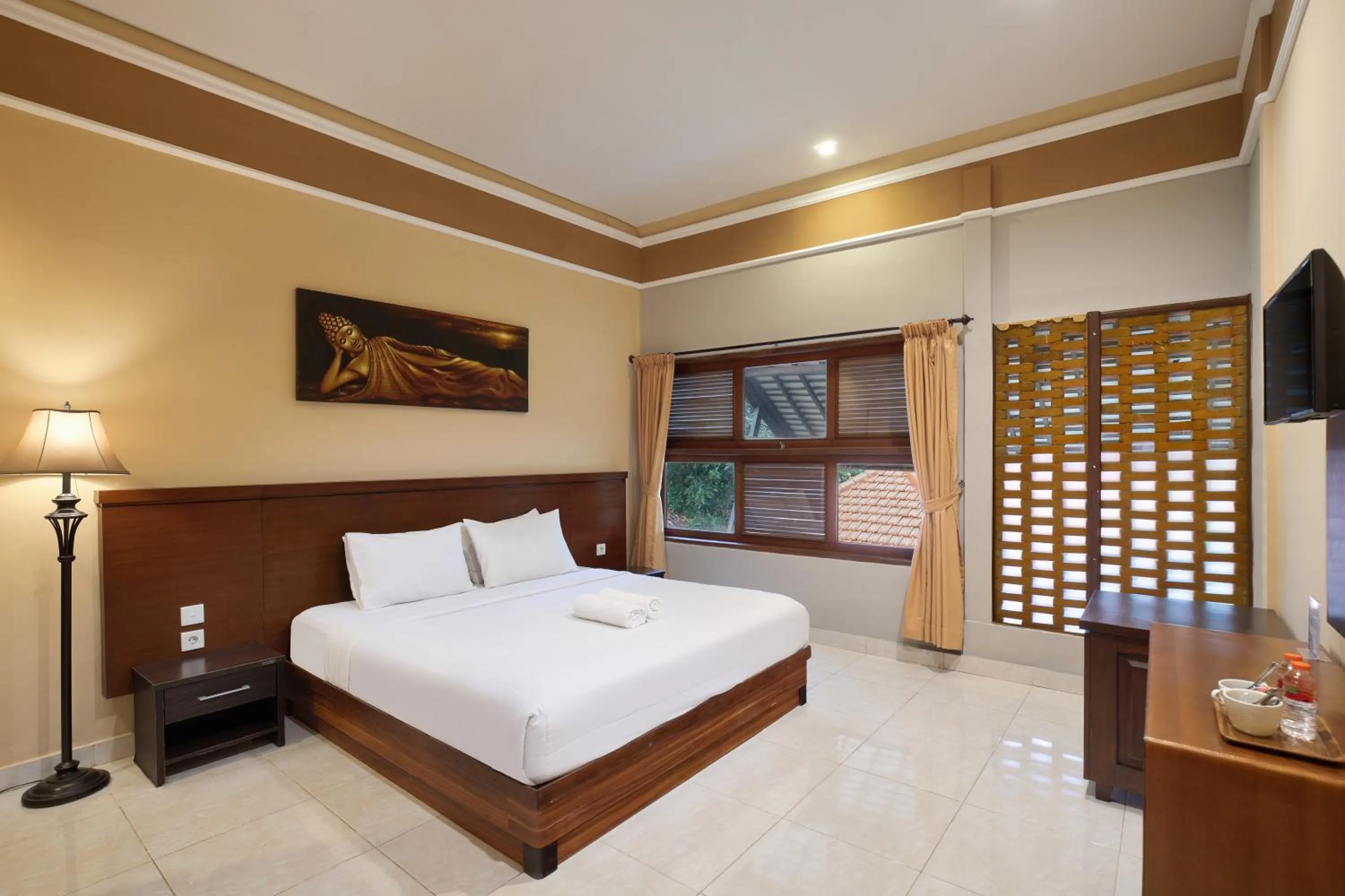 Bed in Mahe Garden Inn and Villas by Kamara