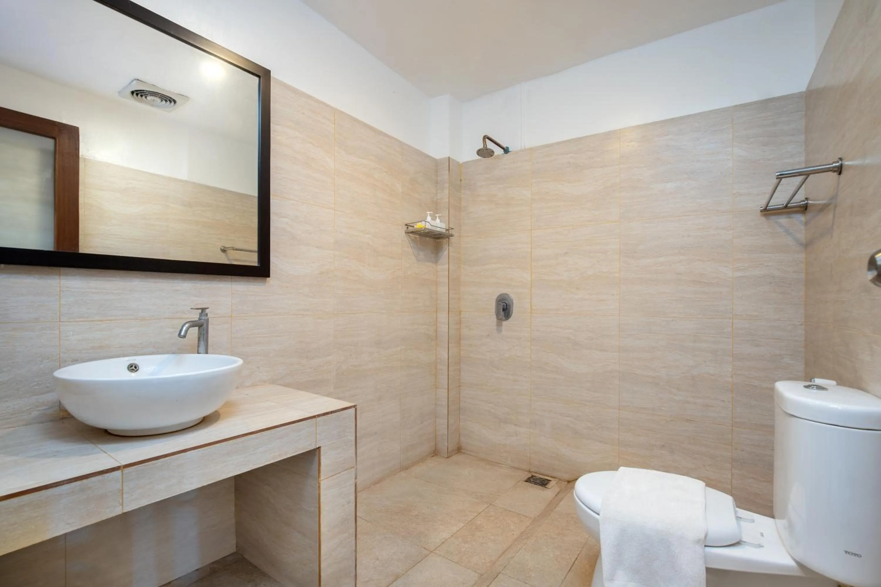 Bathroom in Mahe Garden Inn and Villas by Kamara