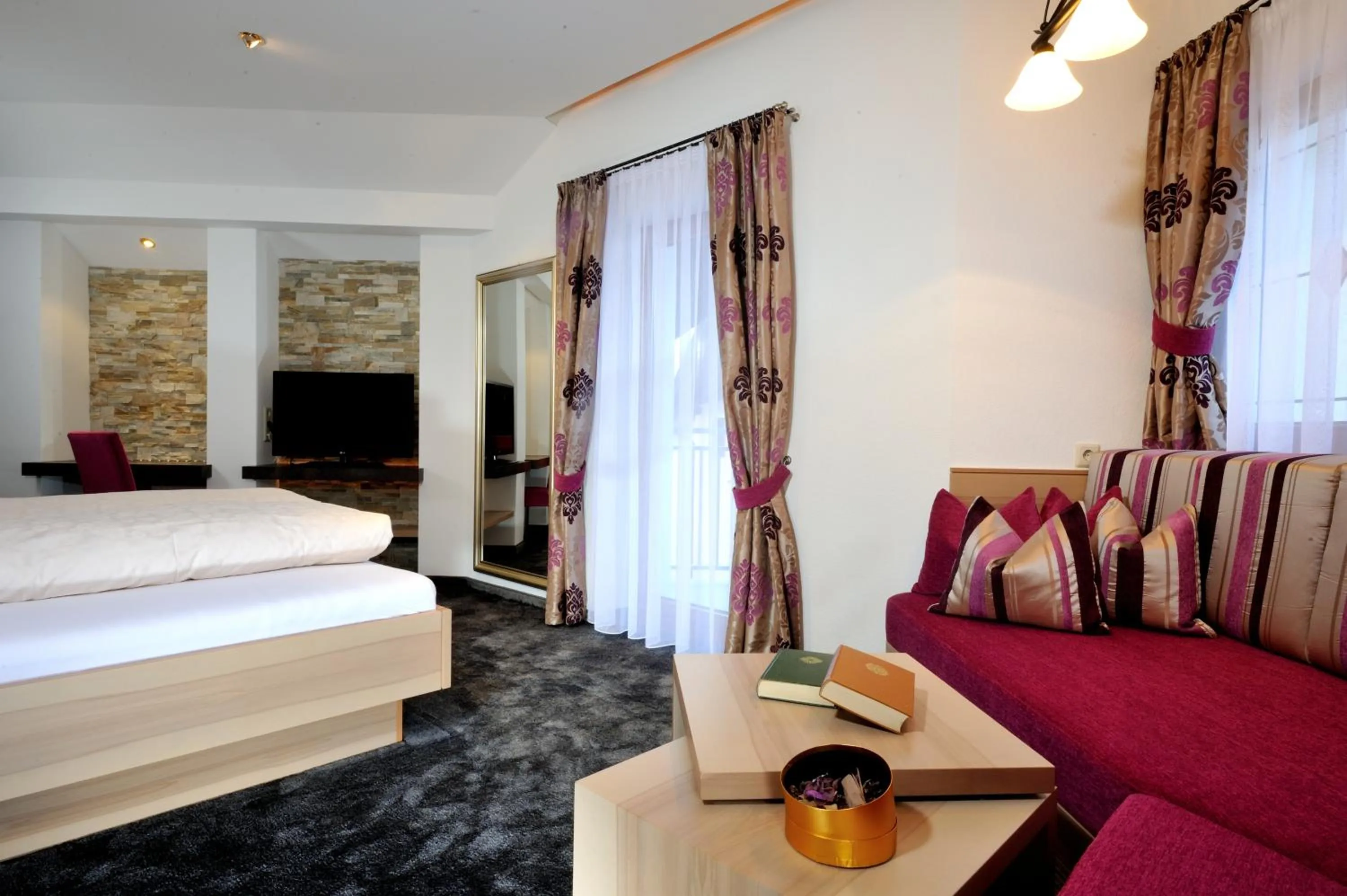 Seating area, Bed in Hotel Garni Stefanie