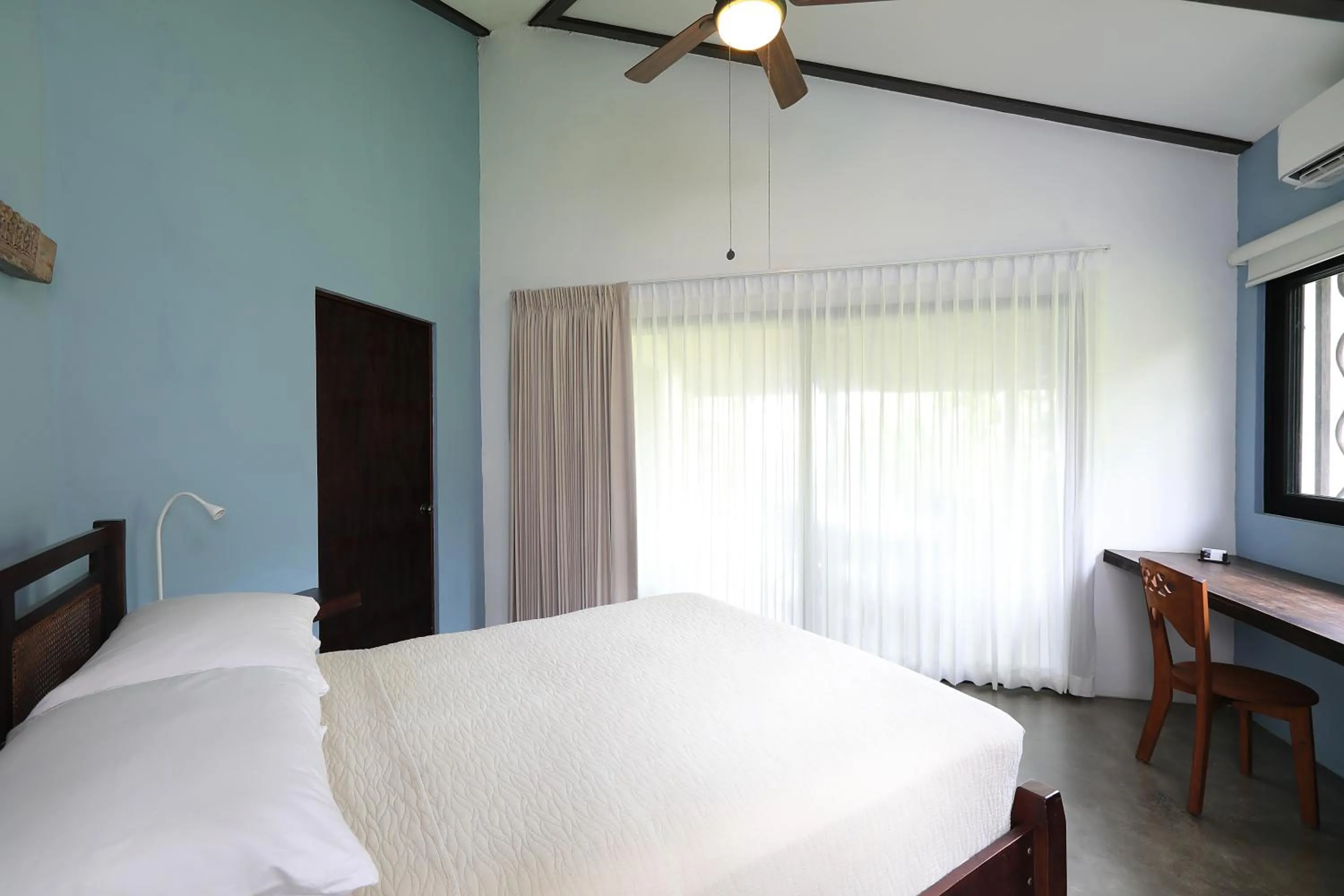 Bedroom, Bed in Casa Frangipani