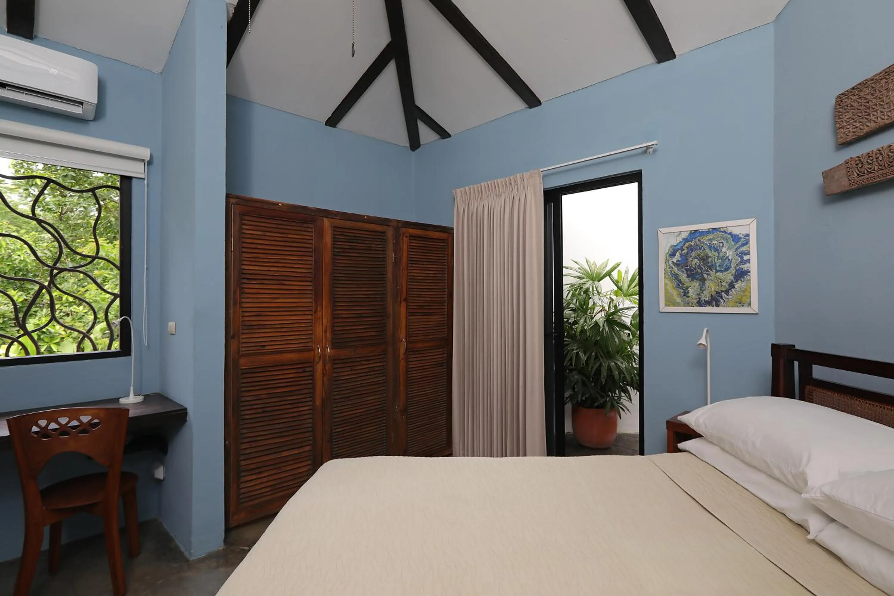 Bedroom, Bed in Casa Frangipani