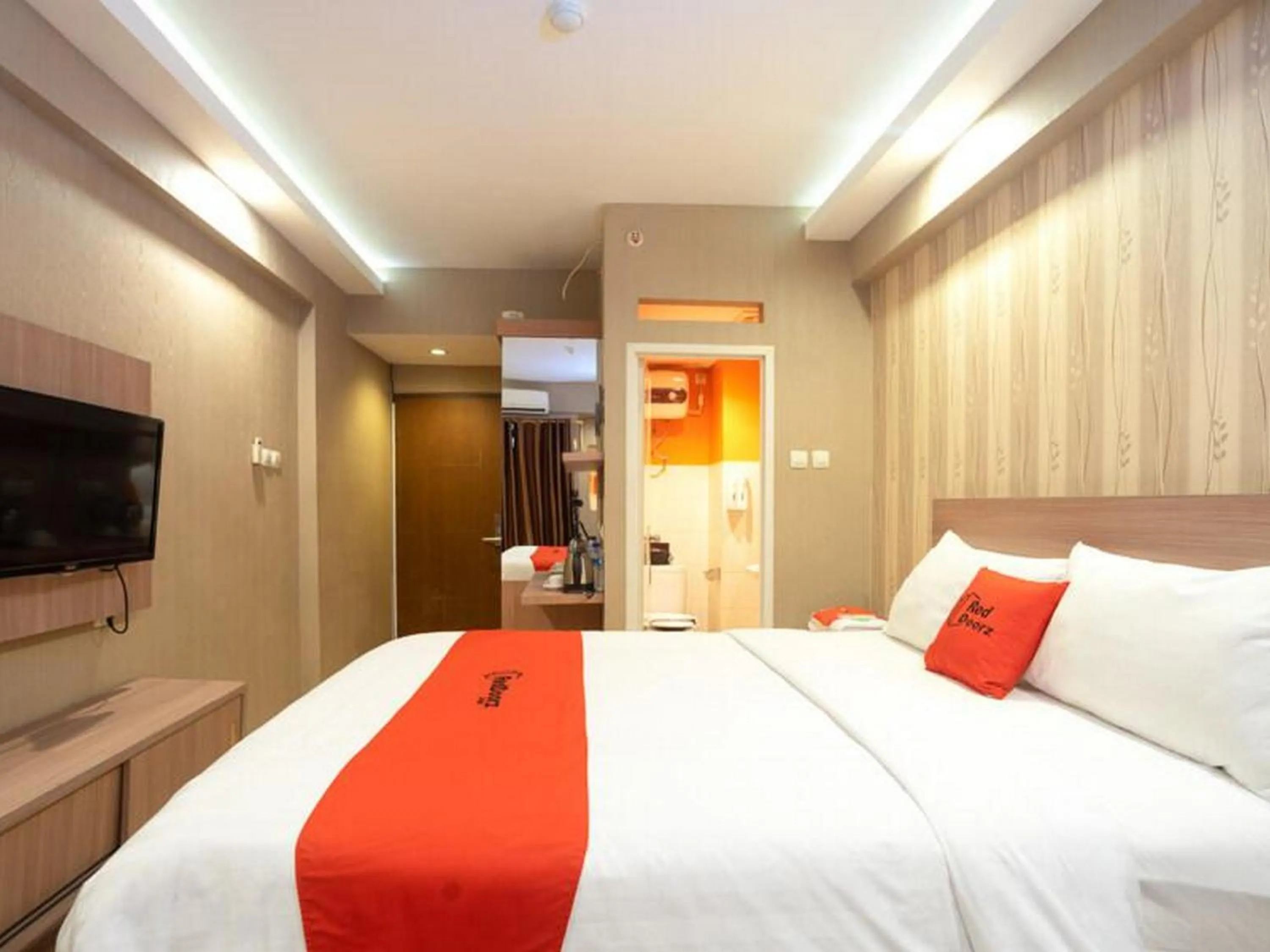 Bedroom, Bed in RedDoorz Apartment at Bogor Valley