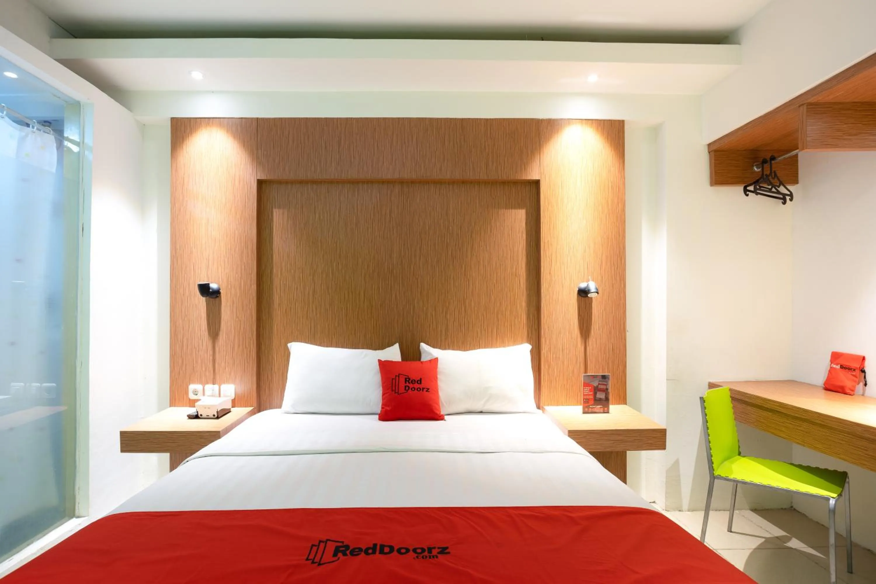 Bedroom, Bed in RedDoorz Apartment at Bogor Valley