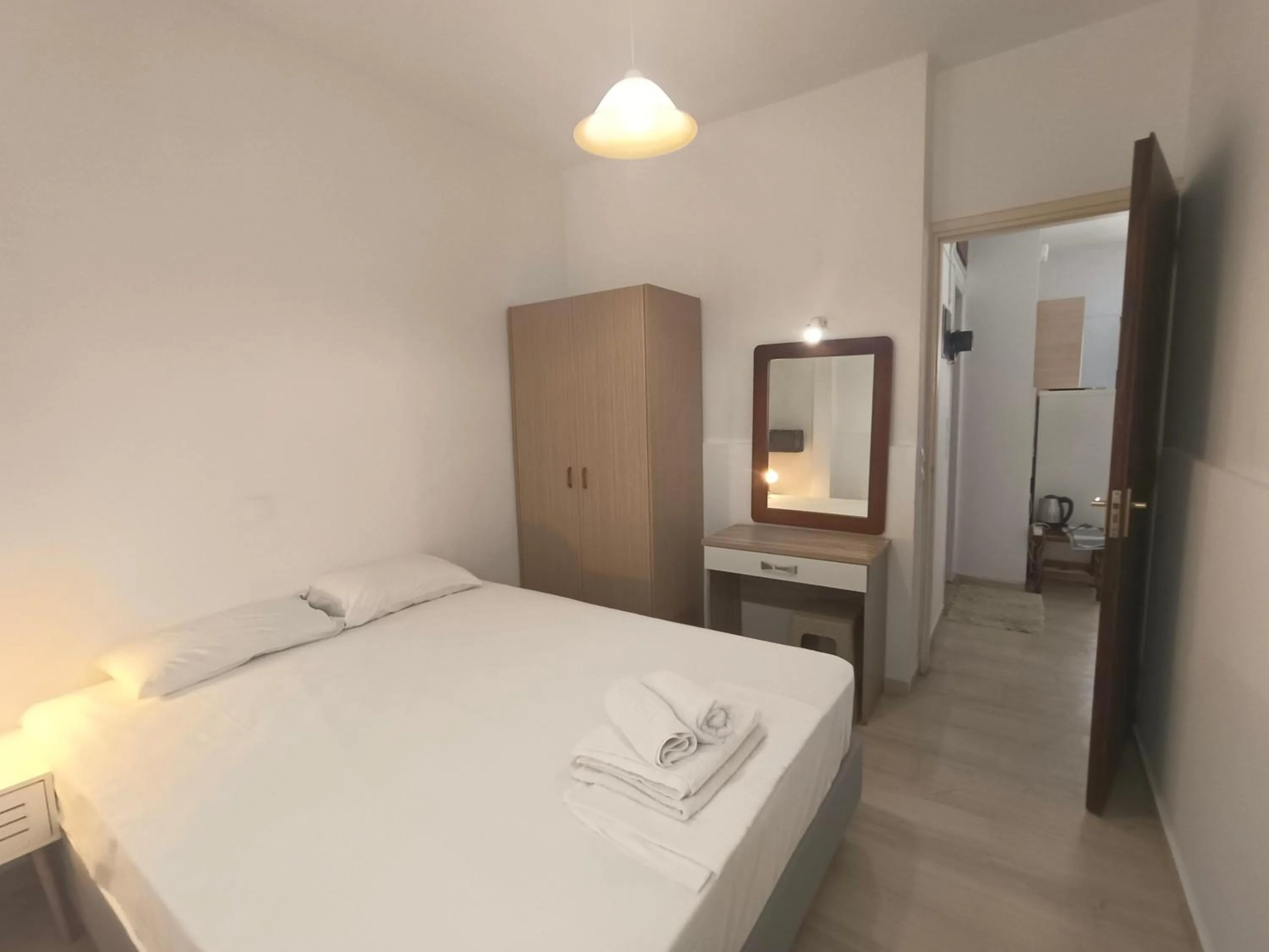 Bed in Albatross Apartments