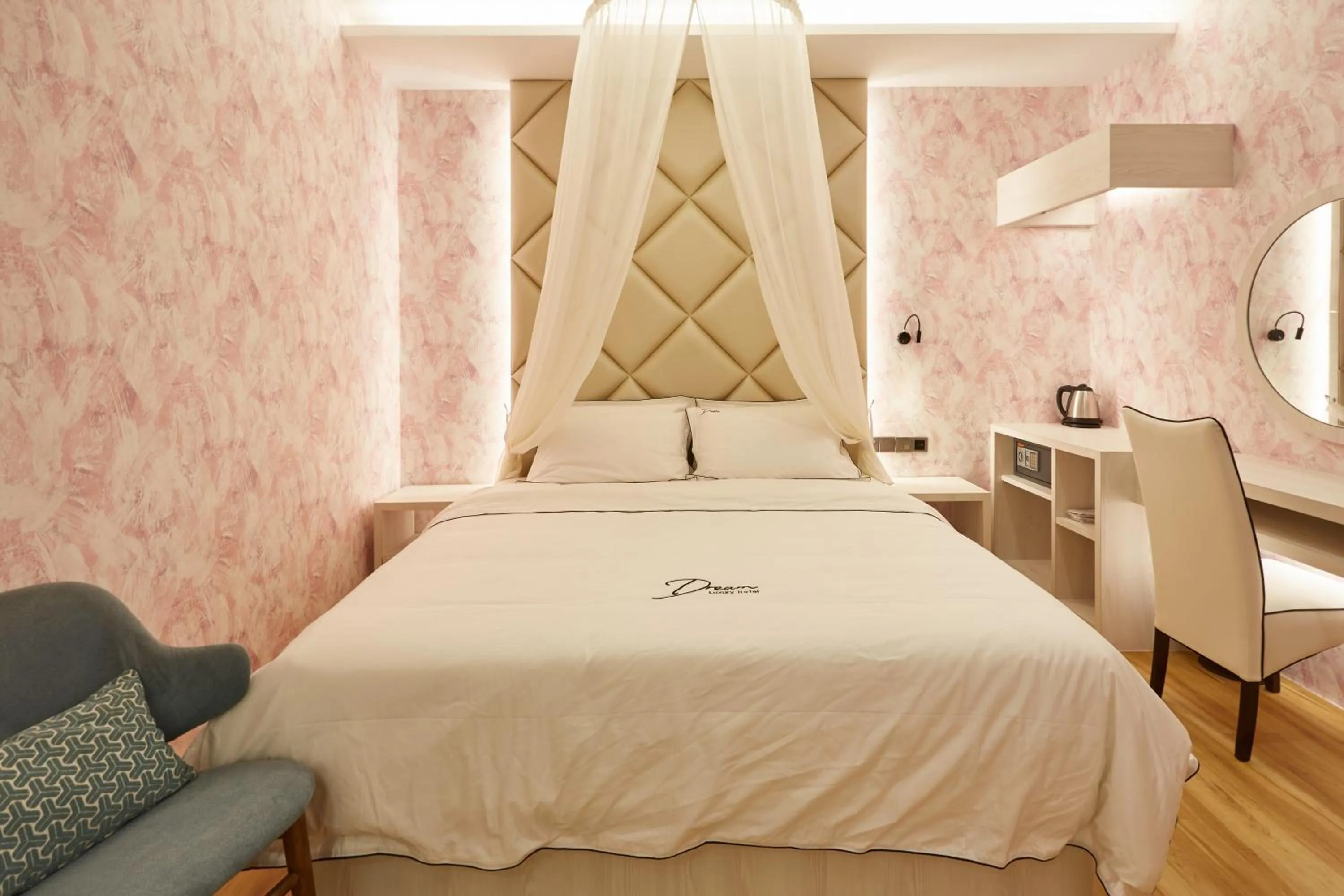 Bed in DREAM LUXURY HOTEL