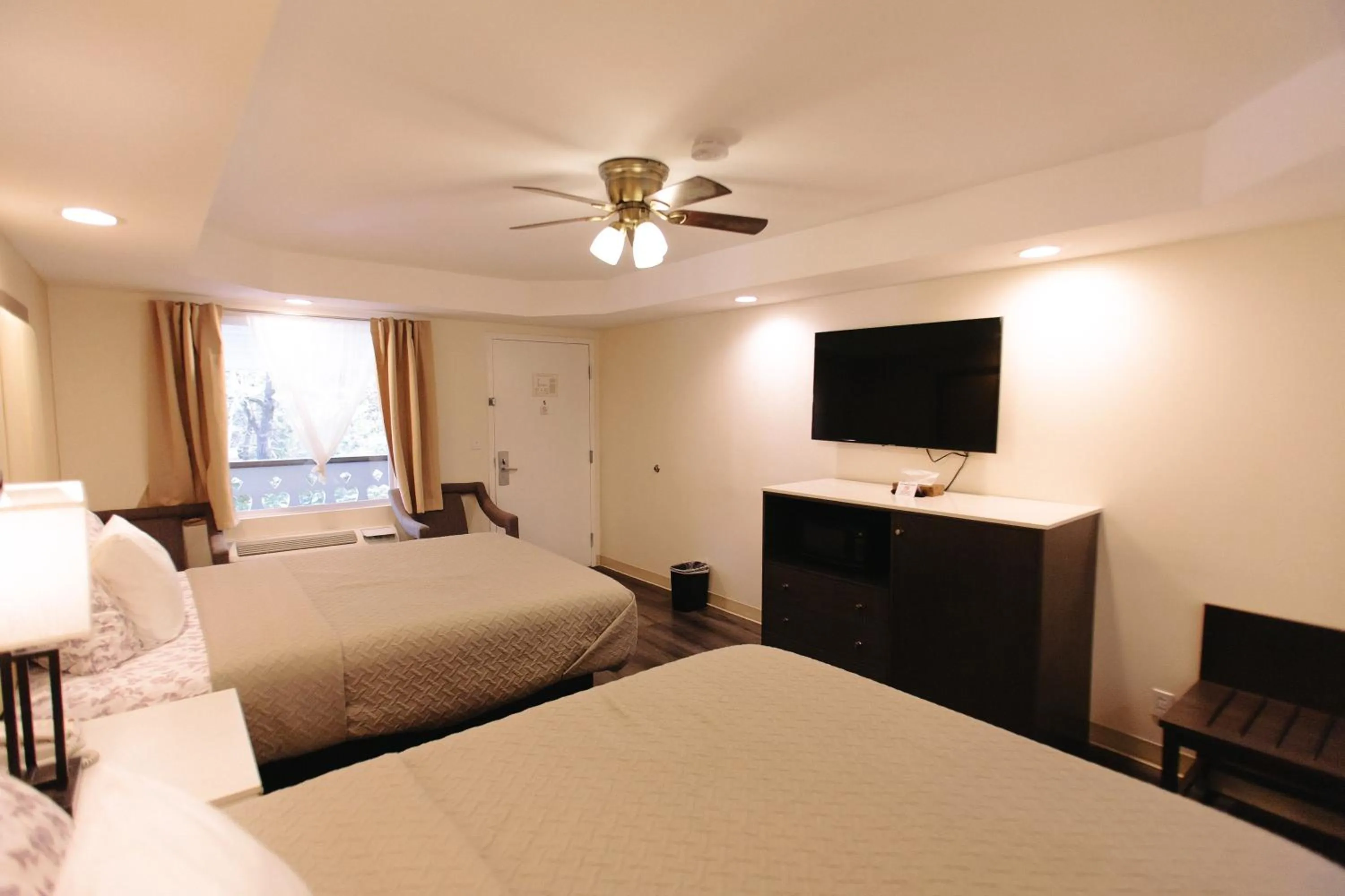 Bed in Riverbend Motel & Cabins