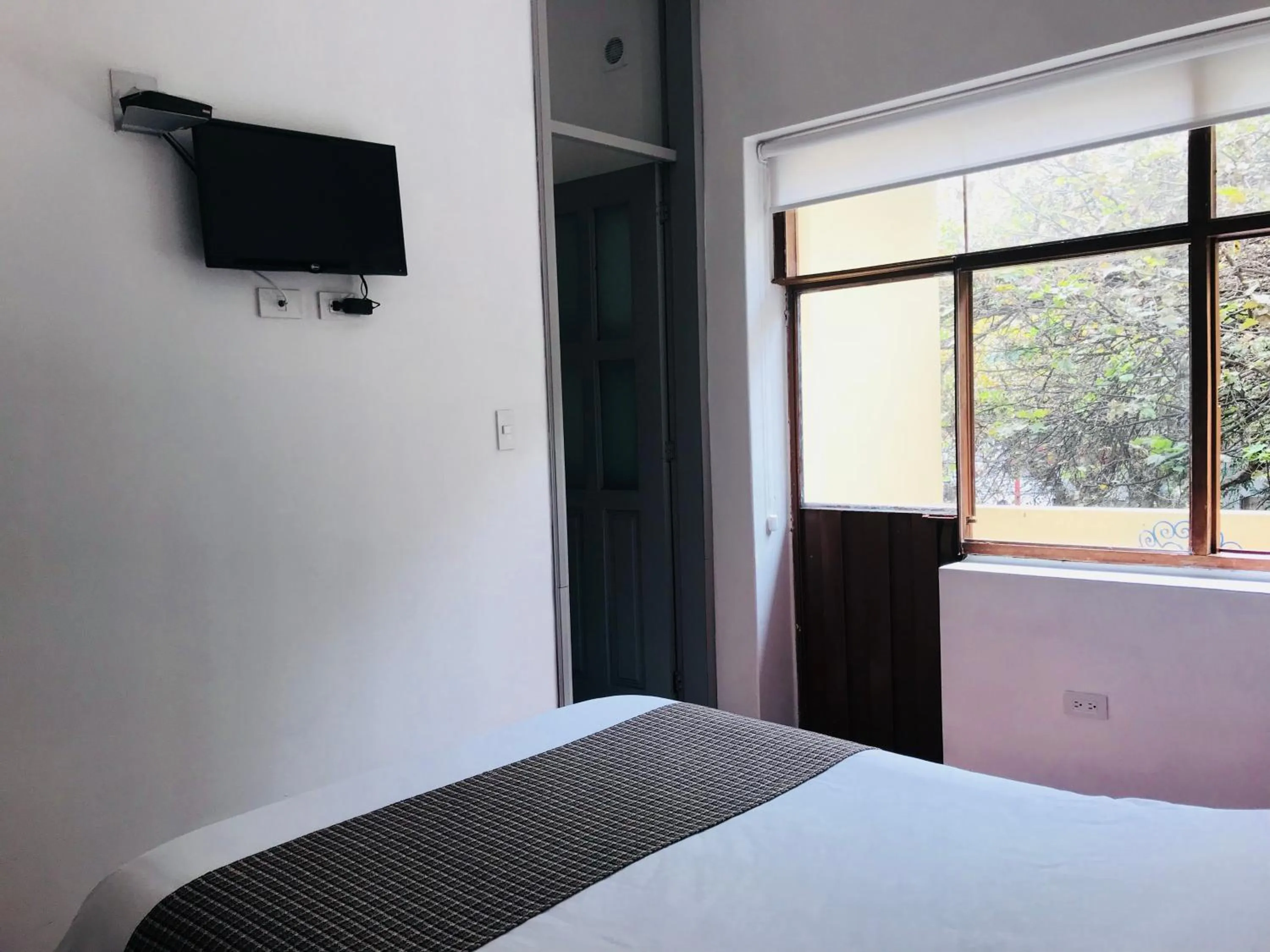 Bed in Hostal Posada del Maple