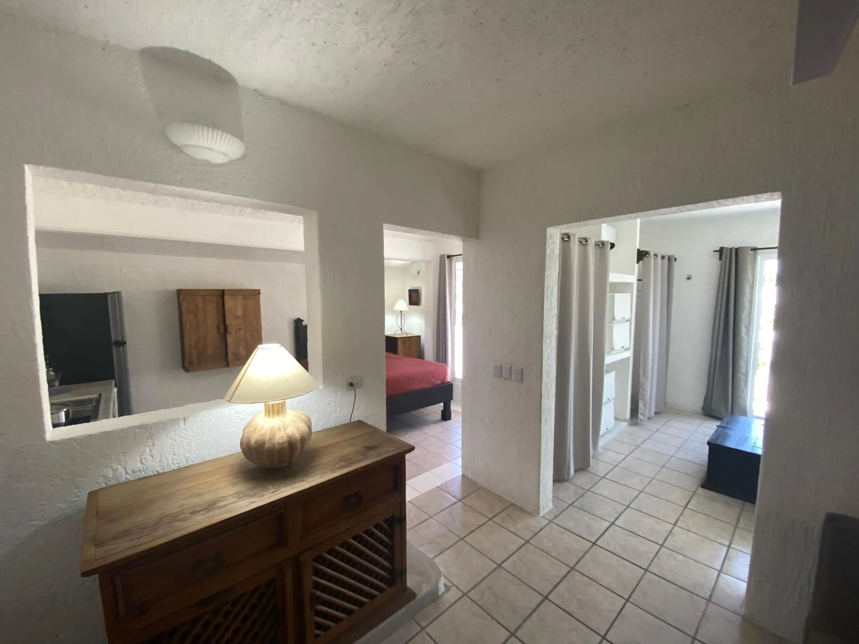 Seating area, Bed in Caribo Cozumel