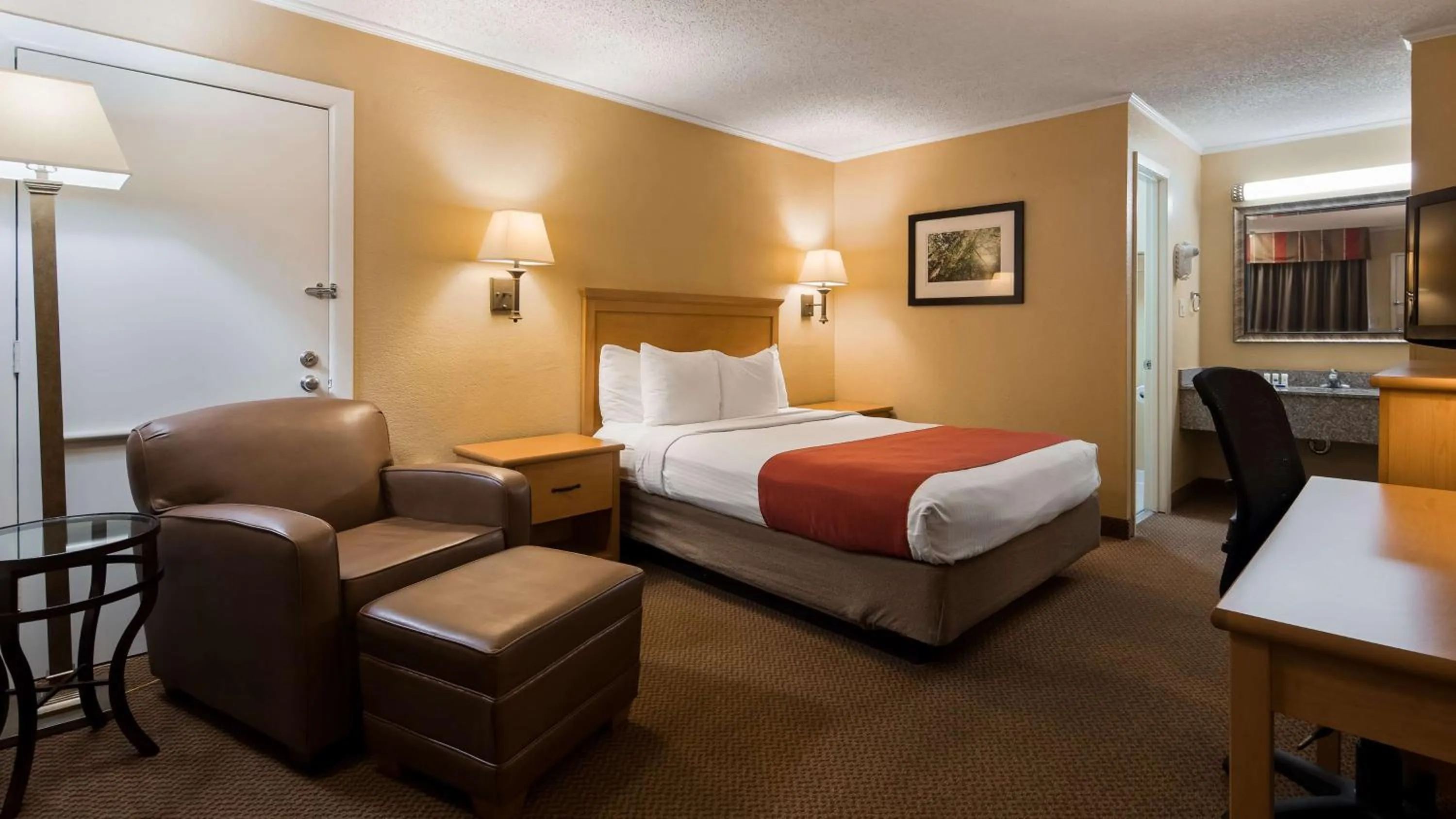 Bathroom, Bed in SureStay Plus by Best Western Covington