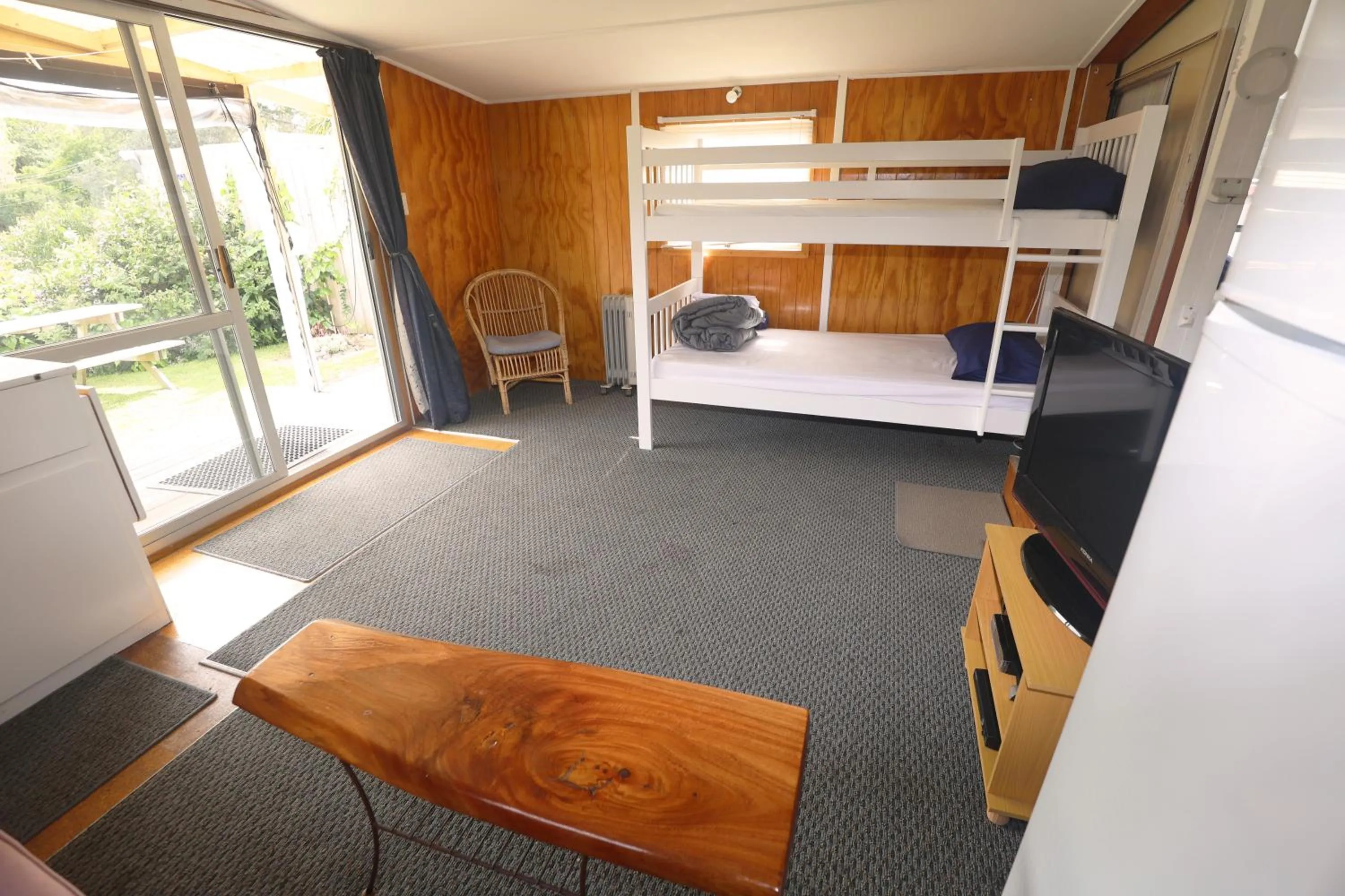 Living room, Bed in Orere Point TOP 10 Holiday Park