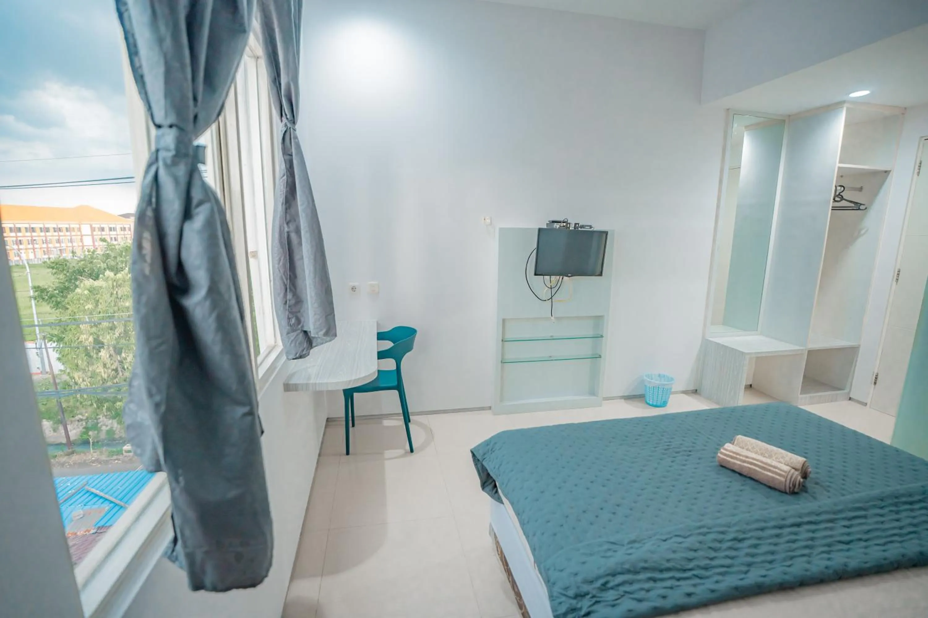 Bedroom, Bed in Hotel Pratisarawirya by The Loka