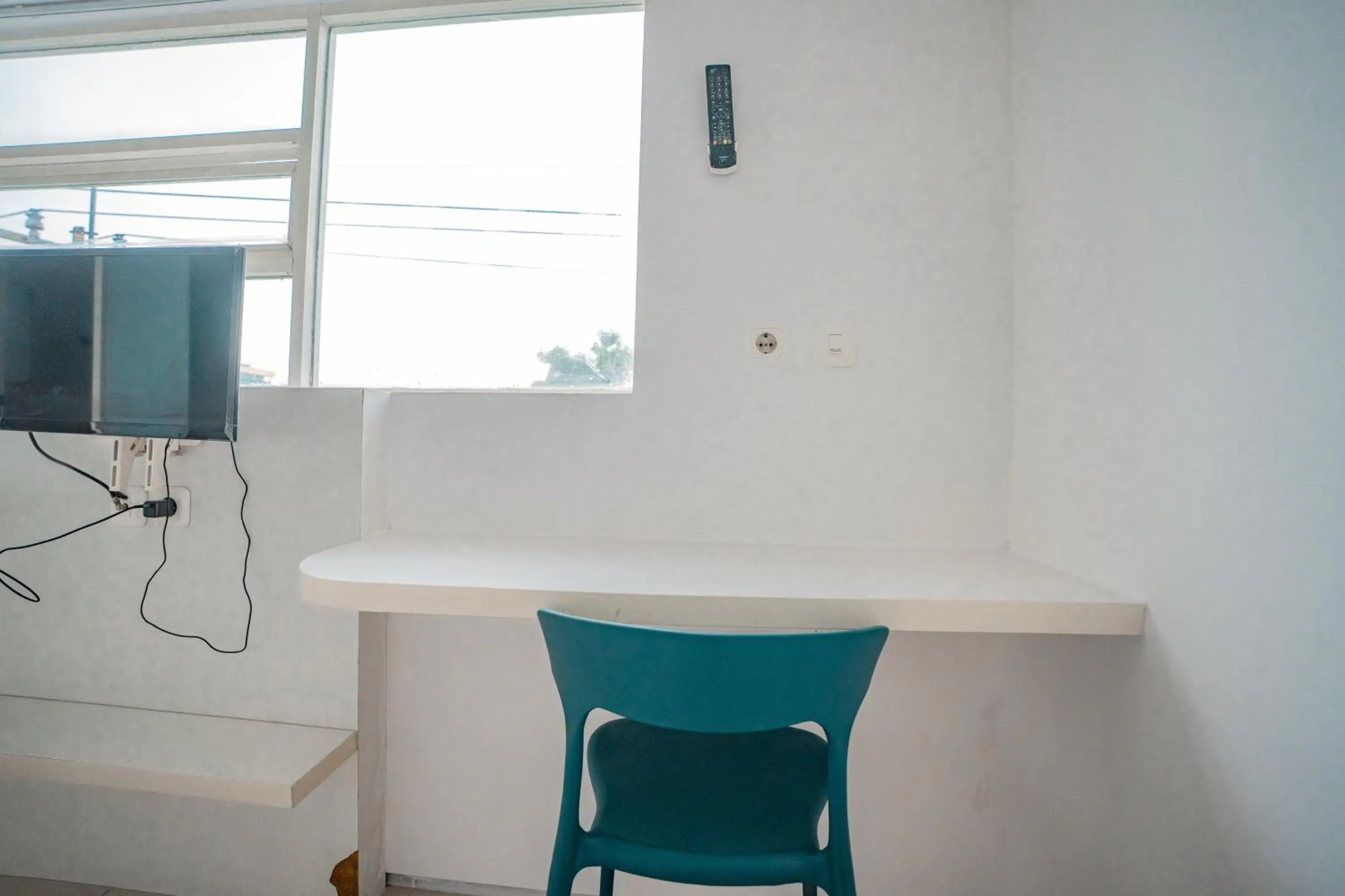 Bedroom in Hotel Pratisarawirya by The Loka