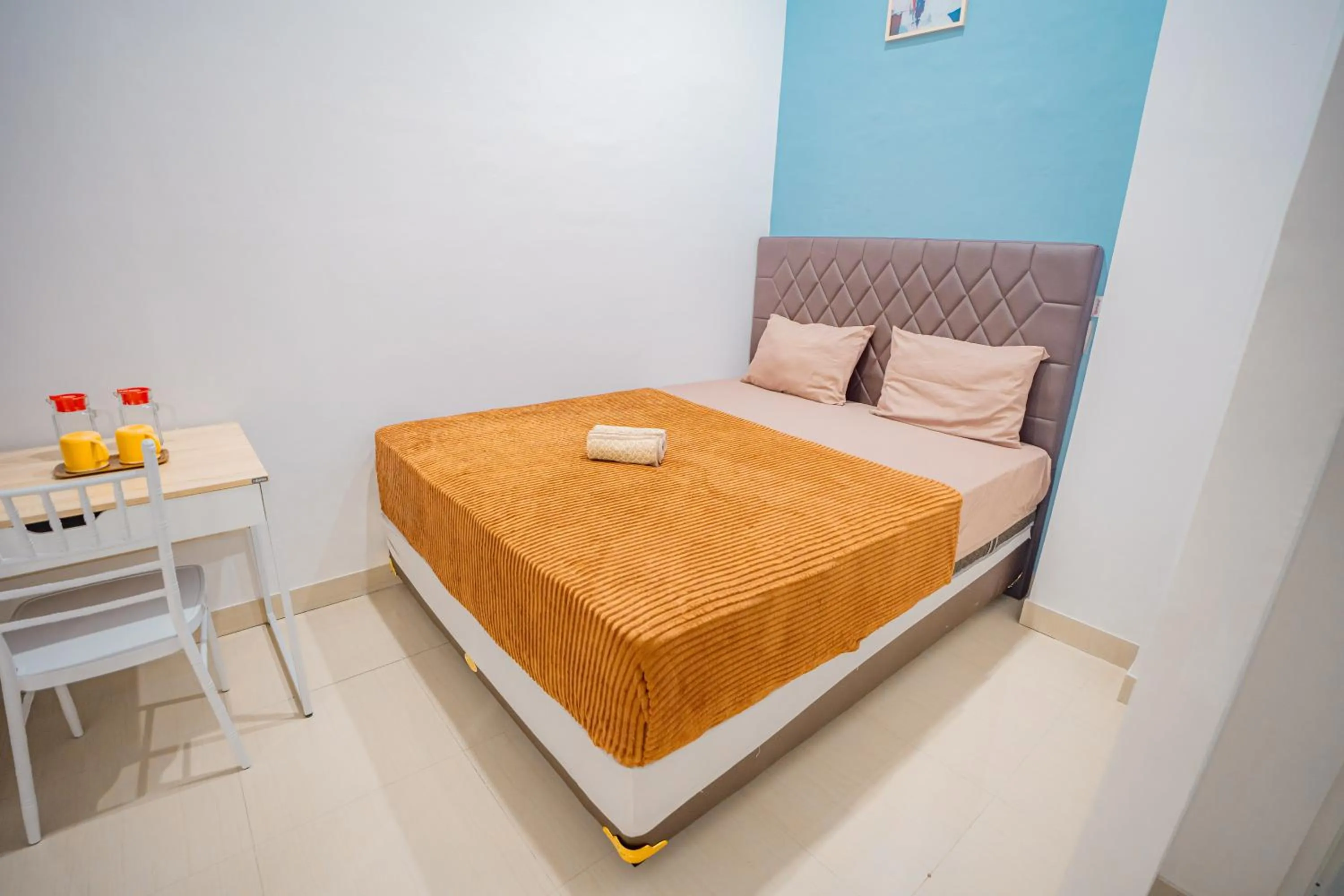 Bed in Hotel Pratisarawirya by The Loka