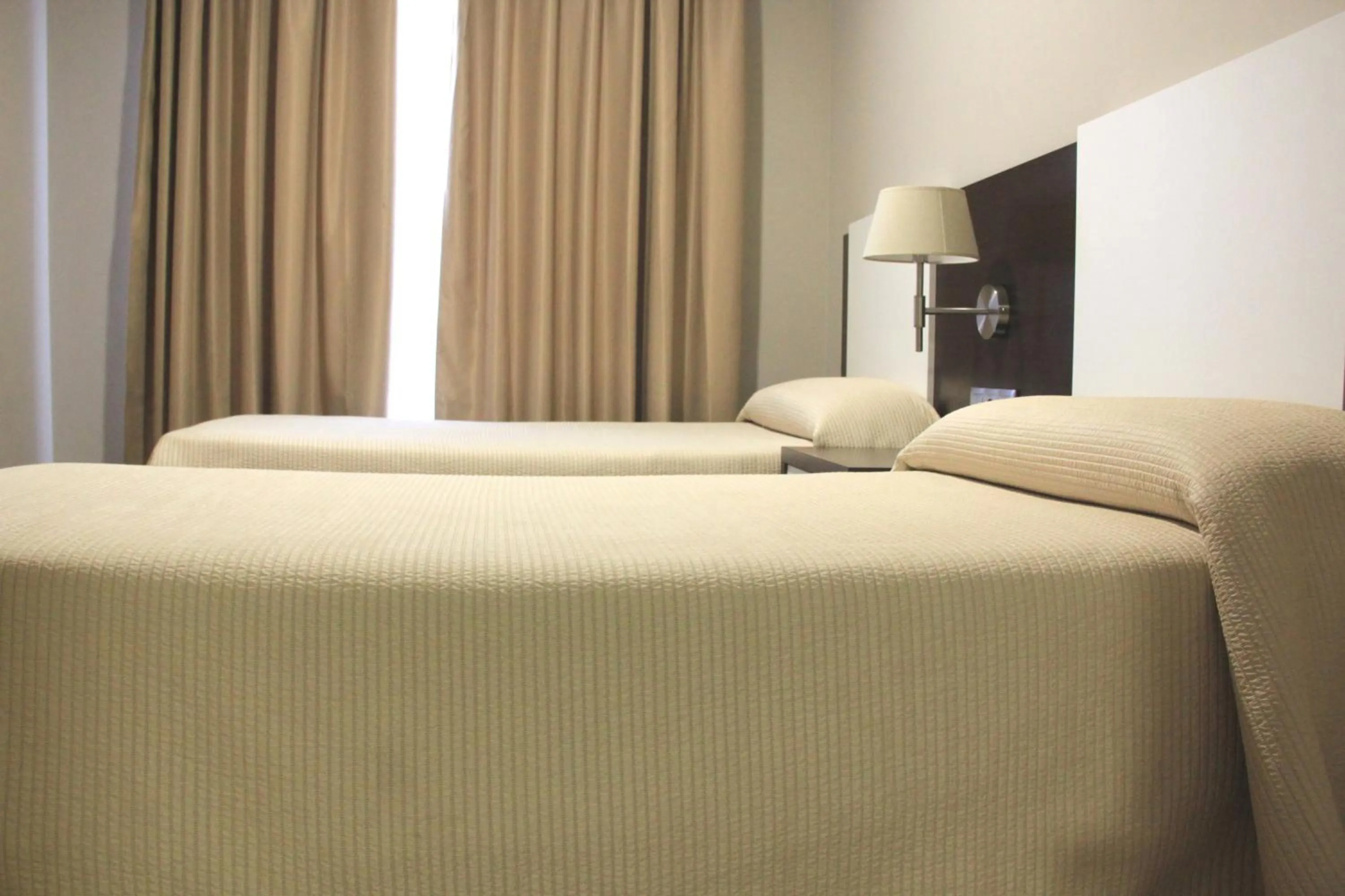 Bed in Apartahotel & Spa Jacetania