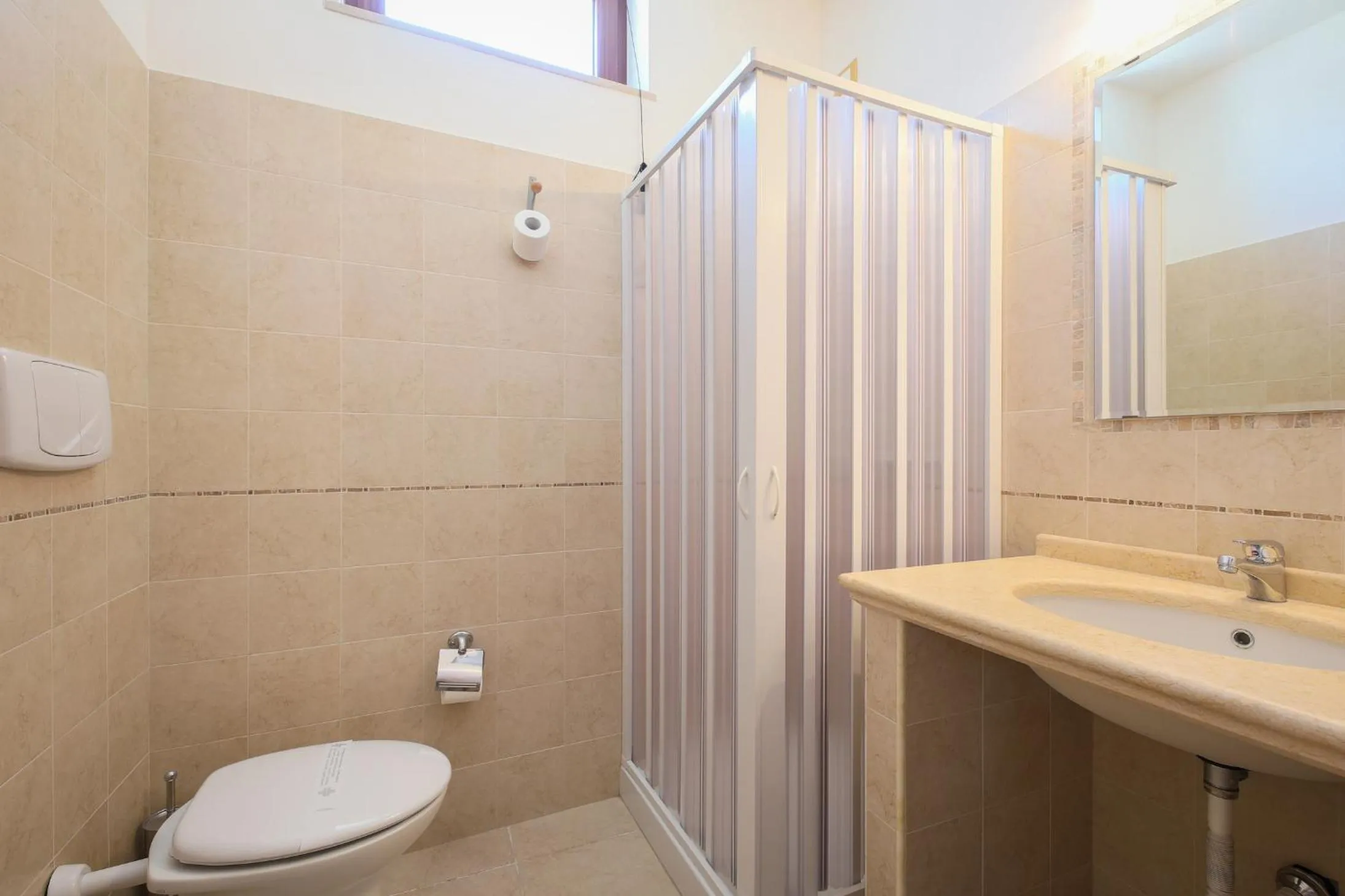 Bathroom in Hotel Corallo