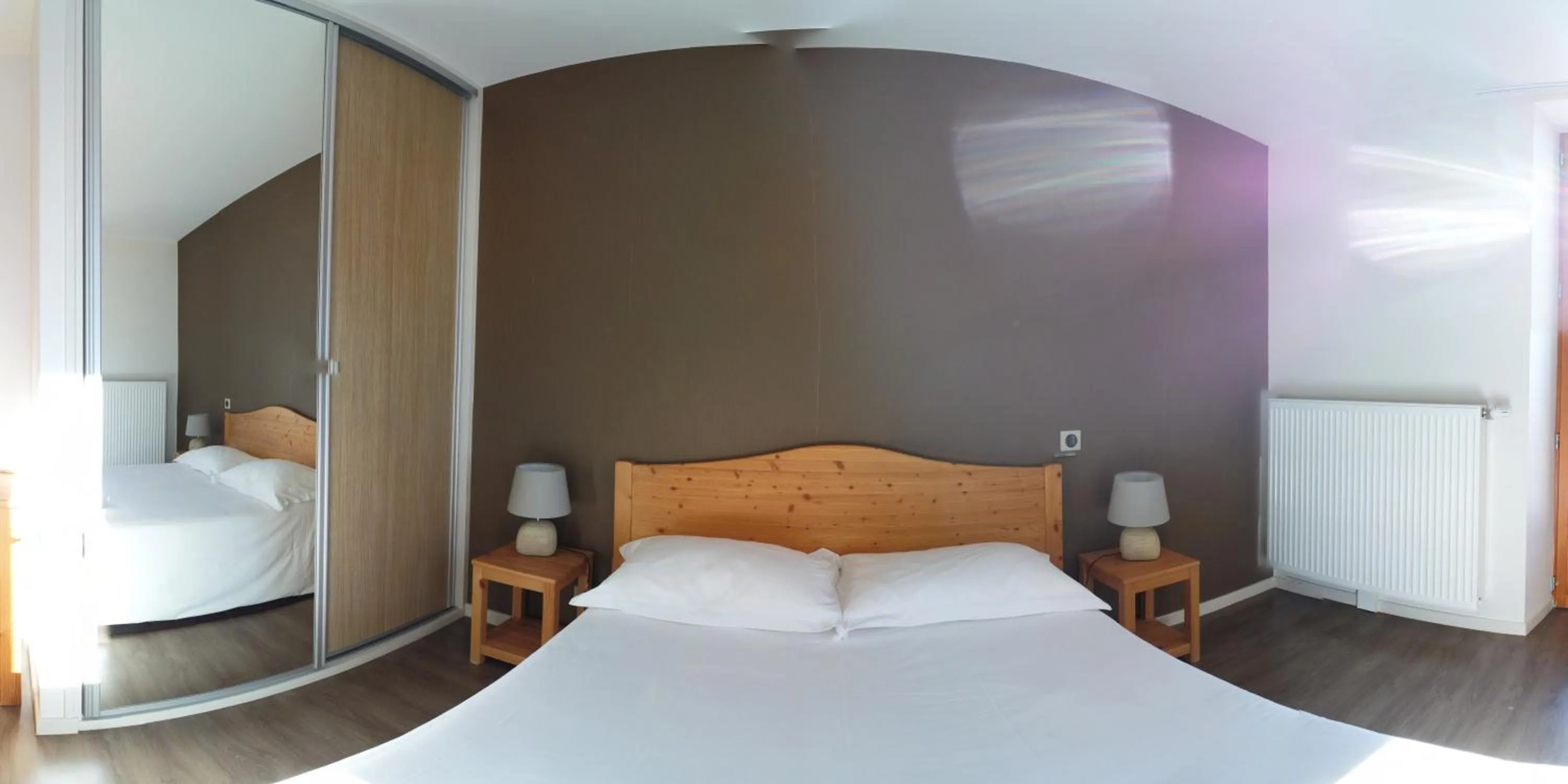 Photo of the whole room, Bed in Hôtel du Soleil
