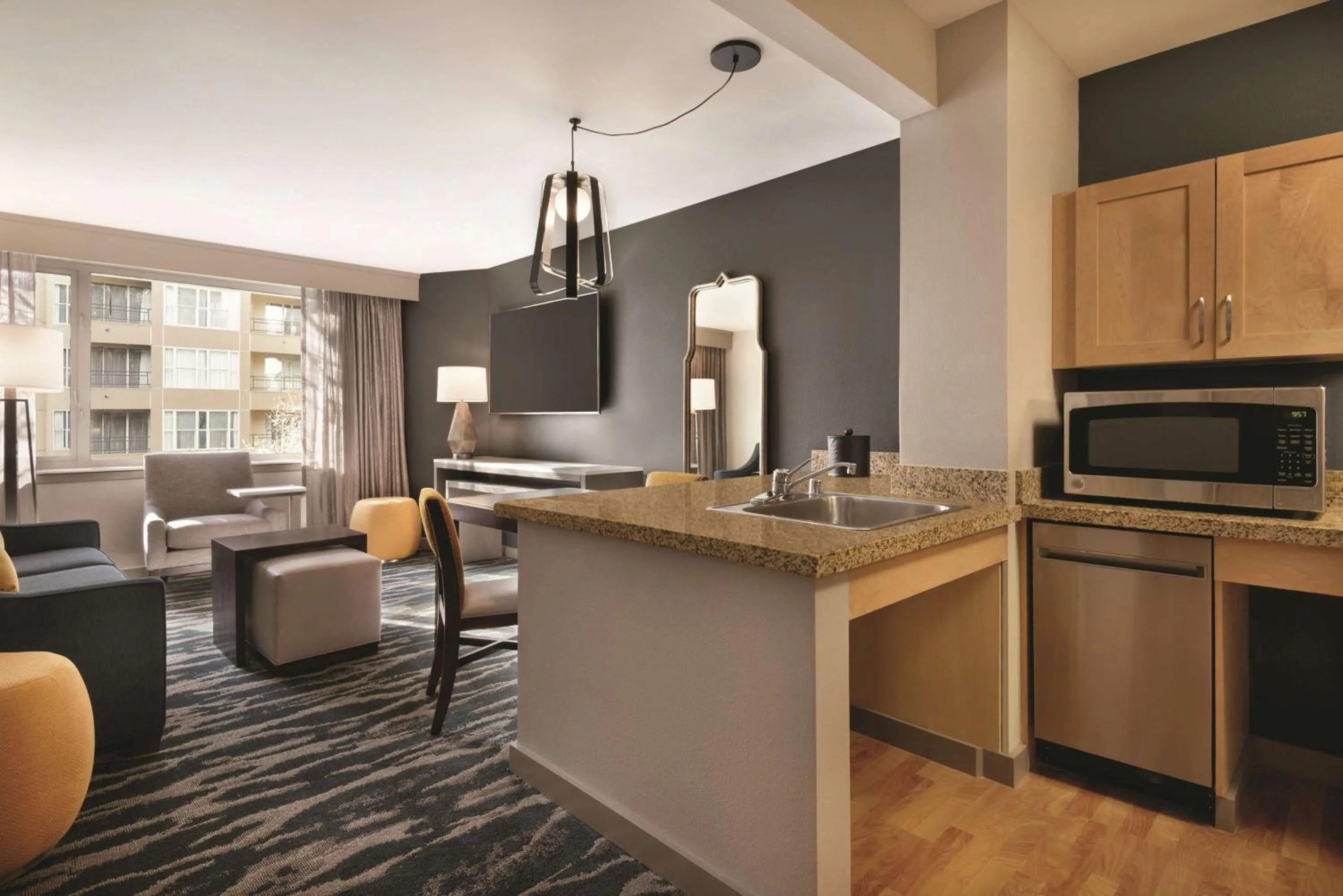 Living room, Kitchen/Kitchenette in Homewood Suites by Hilton-Seattle Convention Center-Pike Street