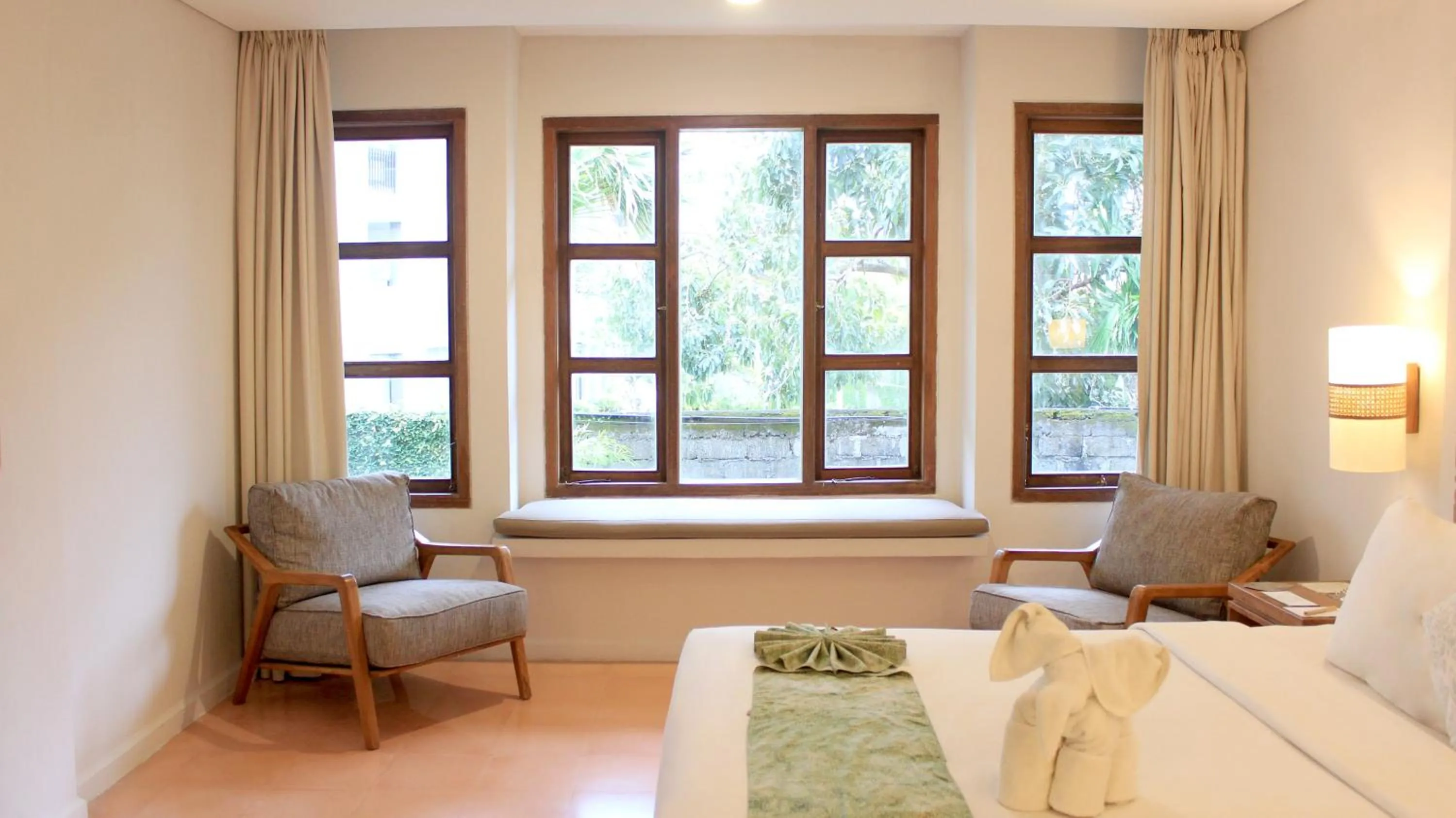 Seating area, Bed in AlamKulkul Boutique Resort