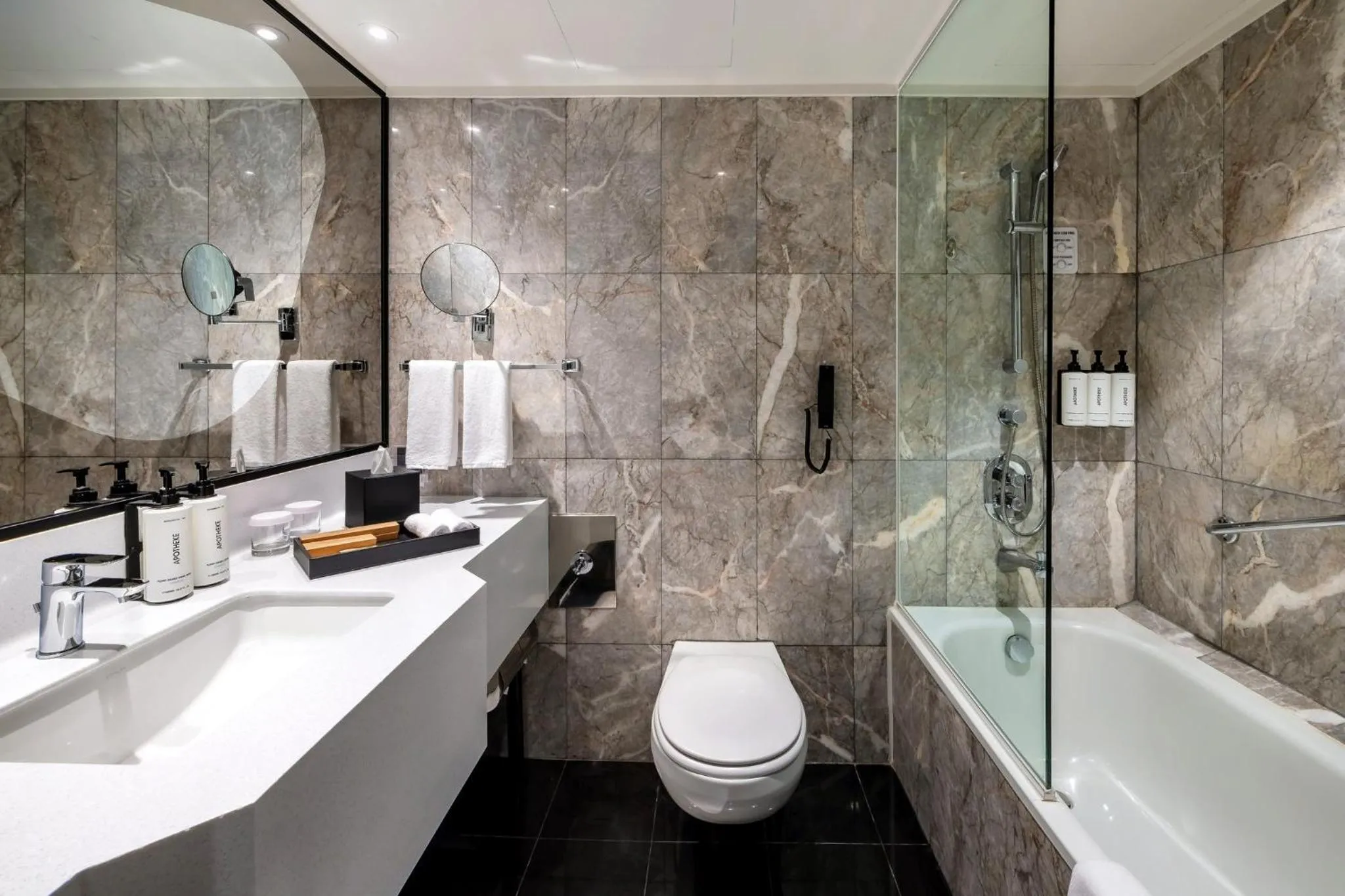 Bathroom in voco Orchard Singapore by IHG