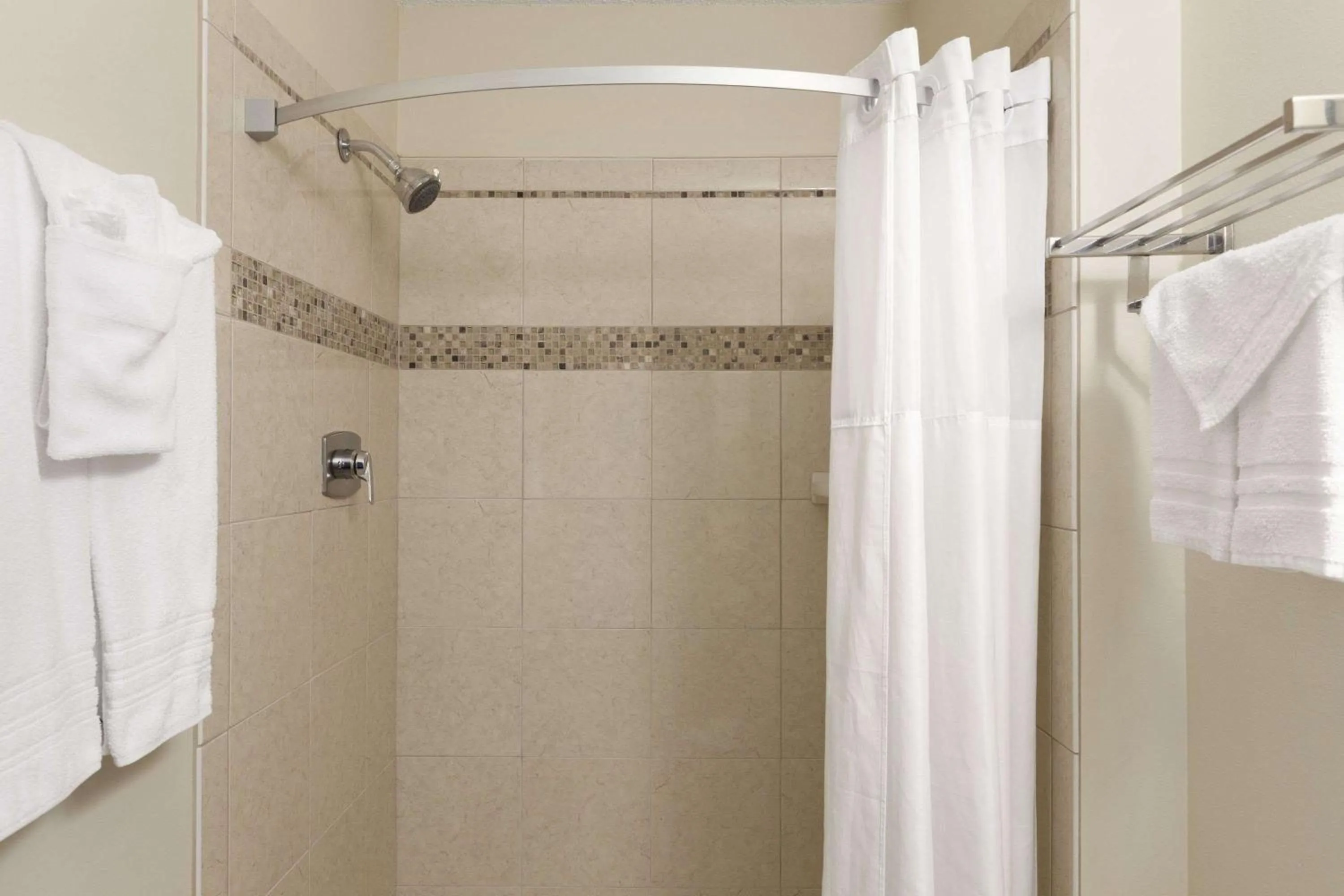 Shower in Travelodge by Wyndham Motel of St Cloud