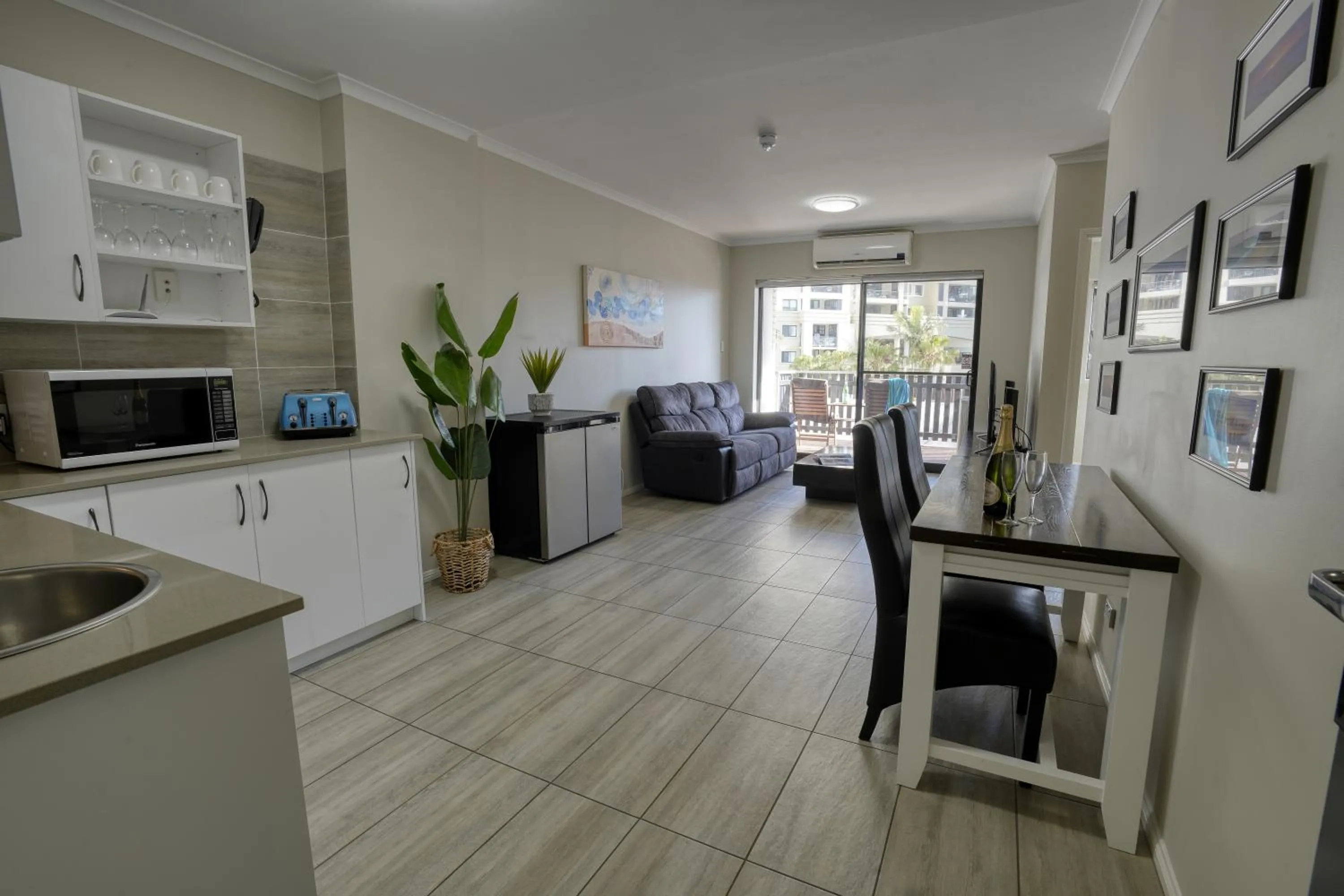 Living room in Central Brunswick Apartment Hotel