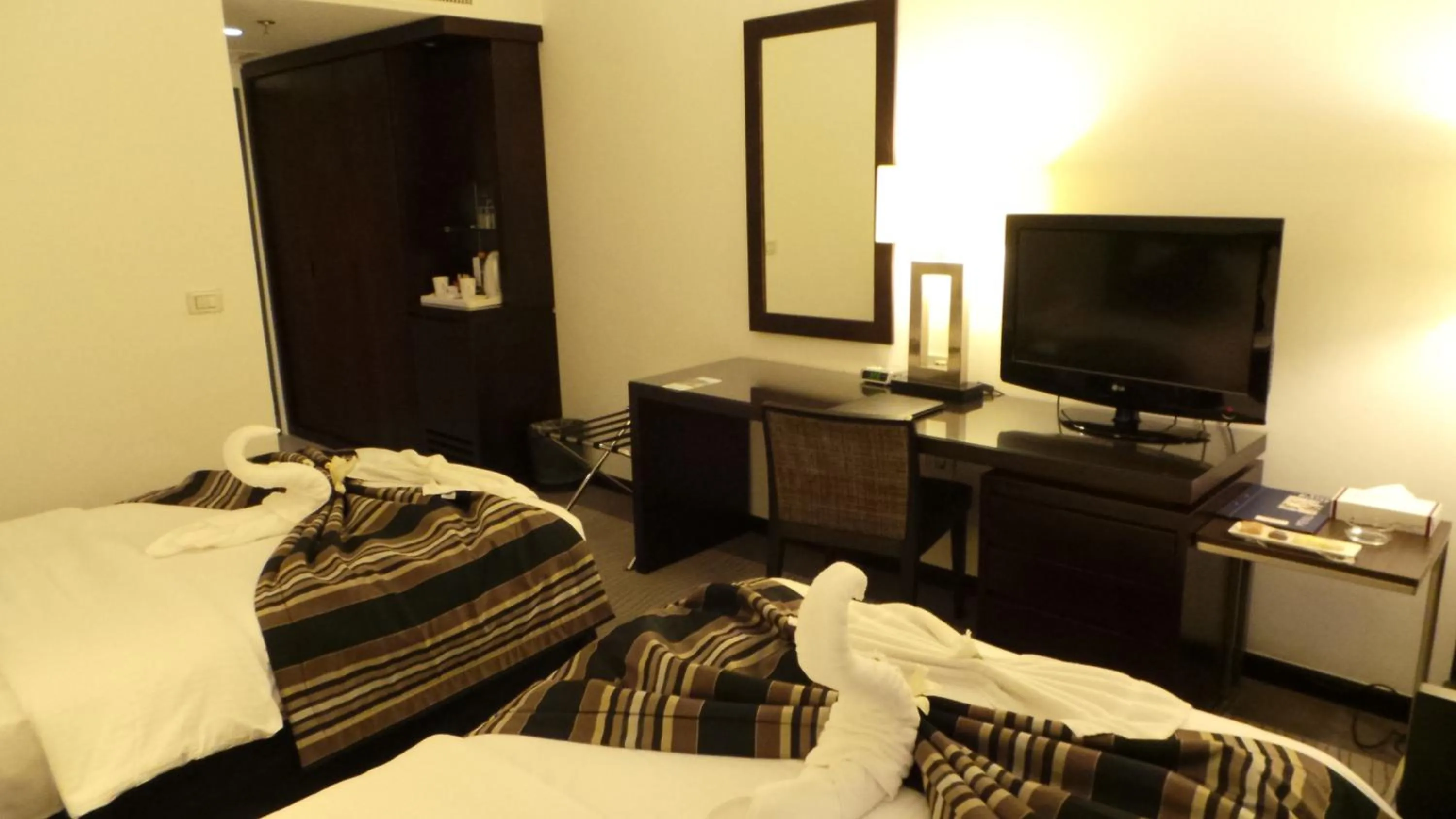 Bed in Amman Airport Hotel