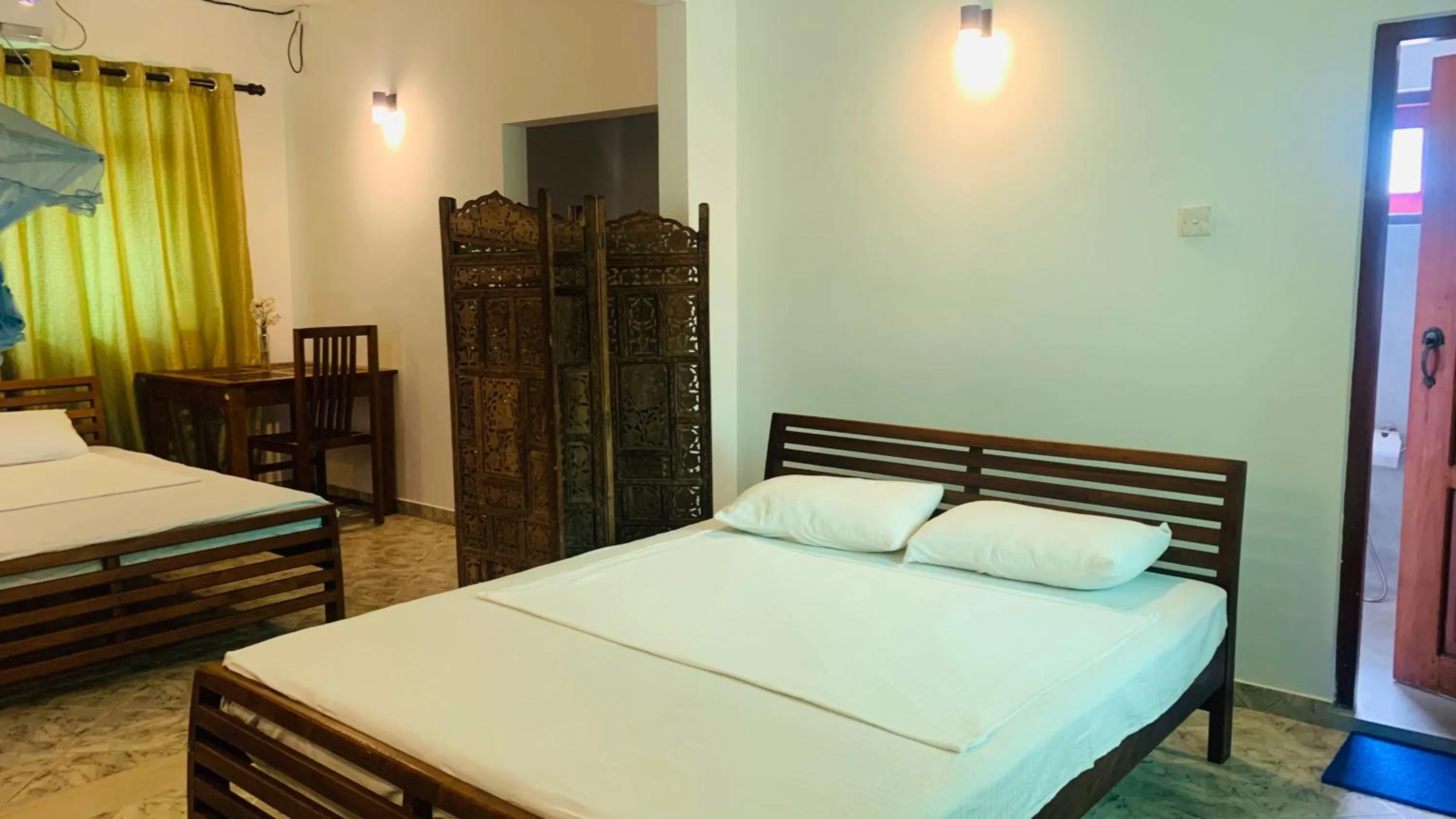 Bed in The Retreat Hotel