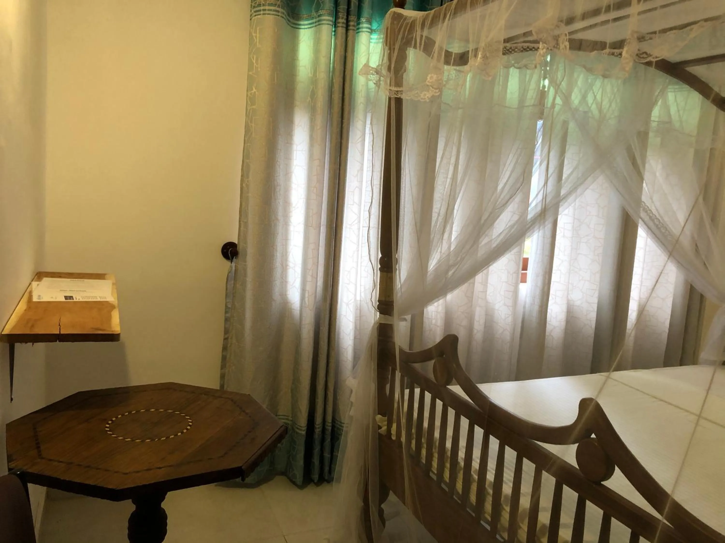 Bed in The Retreat Hotel