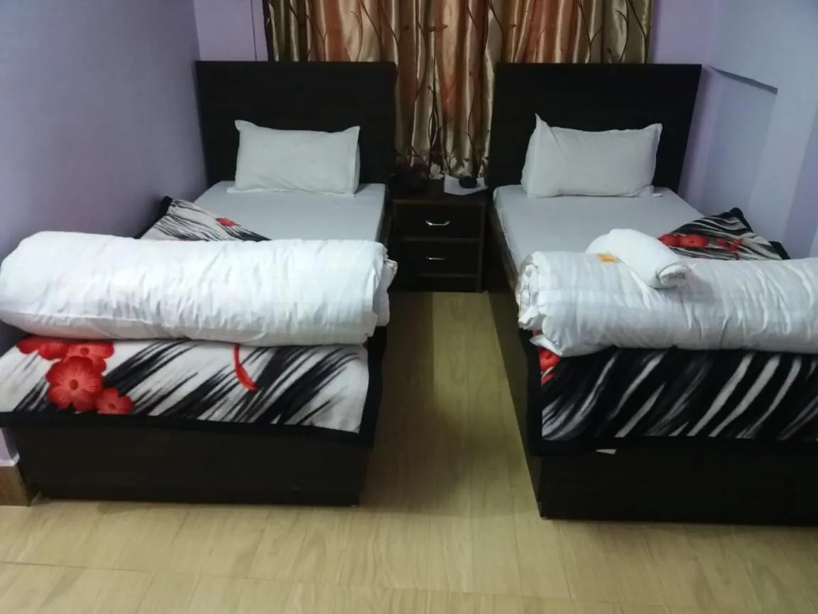 Bed in Buddha Hotel