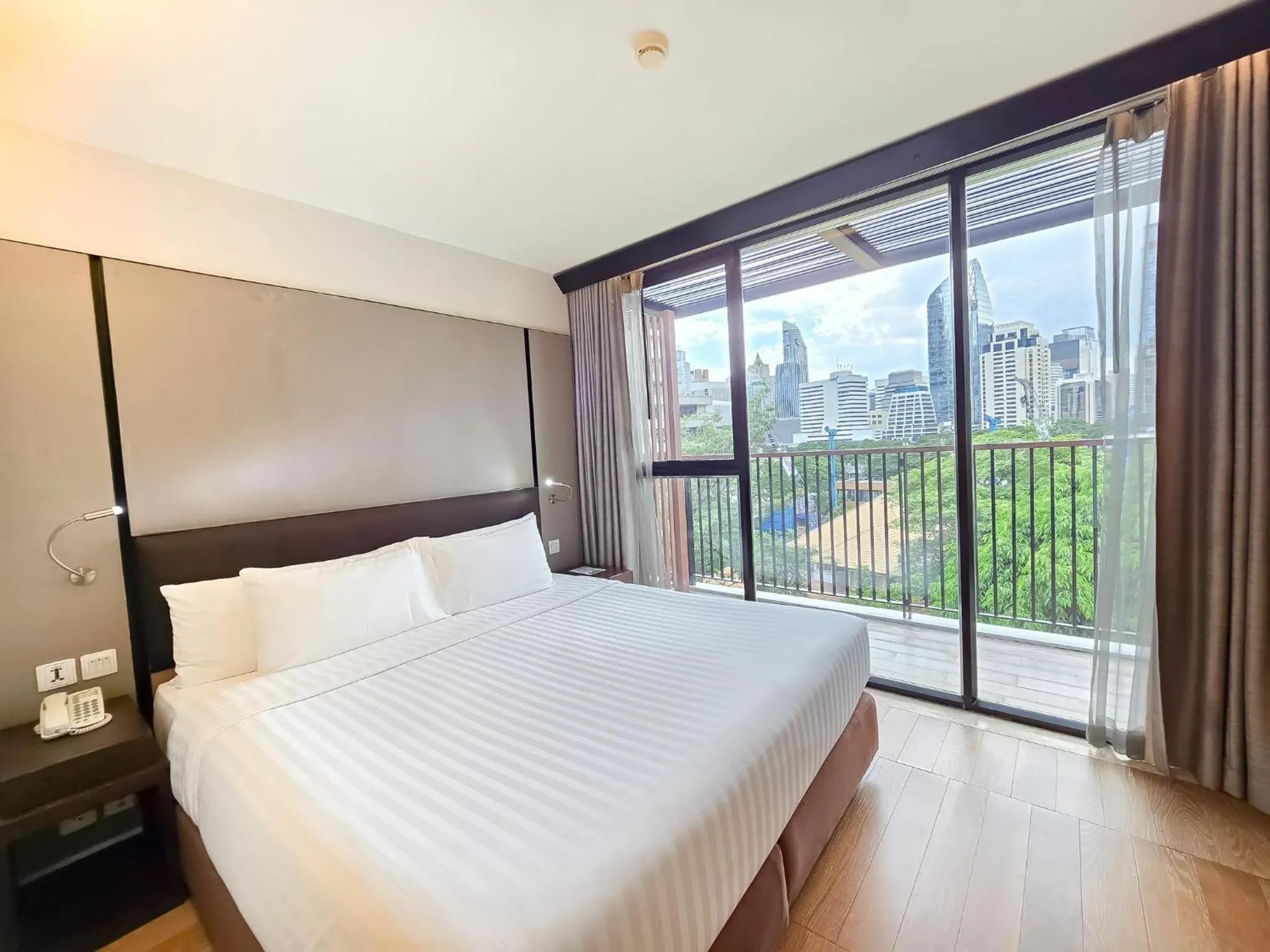 Bedroom, Bed in Arcadia Suites Bangkok